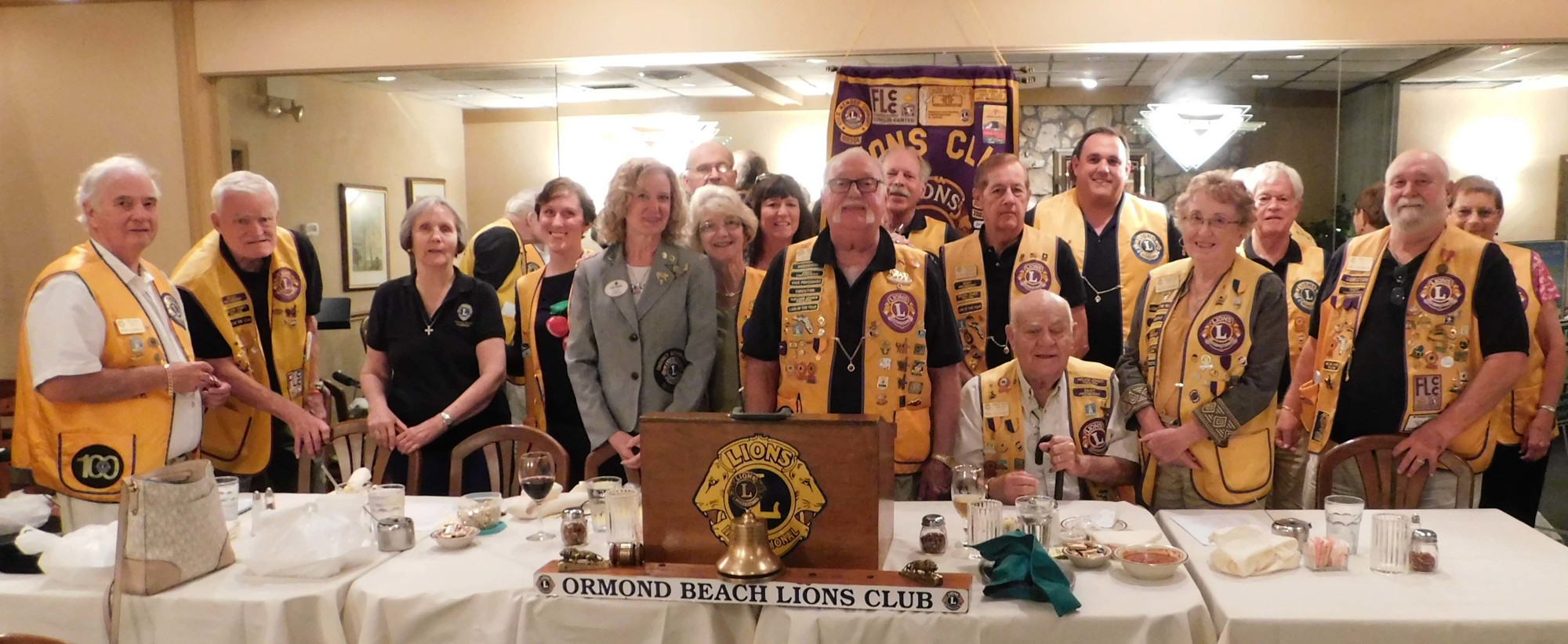 District Governor, Helene Thompson with Ormond Beach Lions President Al Legg and club members at the Sept. 12 meeting. Courtesy photo