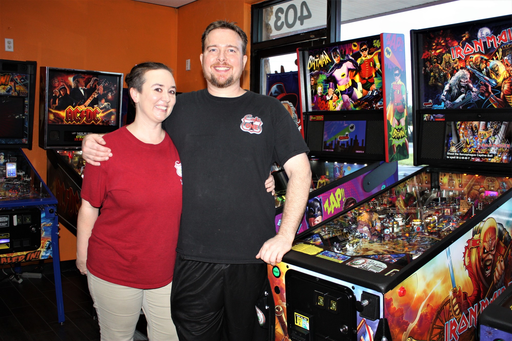 Sanya and Karl Strode offer pinball at their restaurant, Café One. Photo by Wayne Grant
