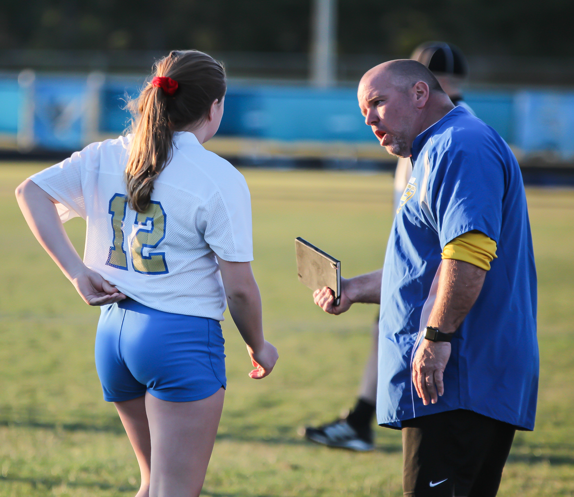 Mainland coach Scott Wilson talks with his daughter, Alexa Wilson, on the sideline during a game against Matanzas. File photo