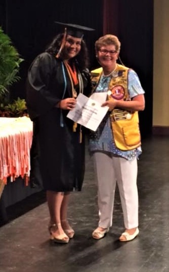 Madison Mulcahy with Lion Bobbie Cheh at the Spruce Creek High School awards ceremony. Courtesy photo