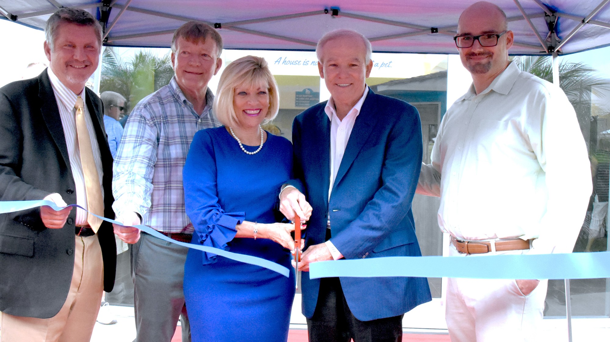 At the ribbon cutting are Randy Dye, Daytona Beach Chamber of Commerce chairman of the board; Mel Stack, HHS board president; Nancy and Lowell Lohman; and Miguel Abi-hassan, CEO of Halifax Humane Society. Courtesy photo Humane Society.