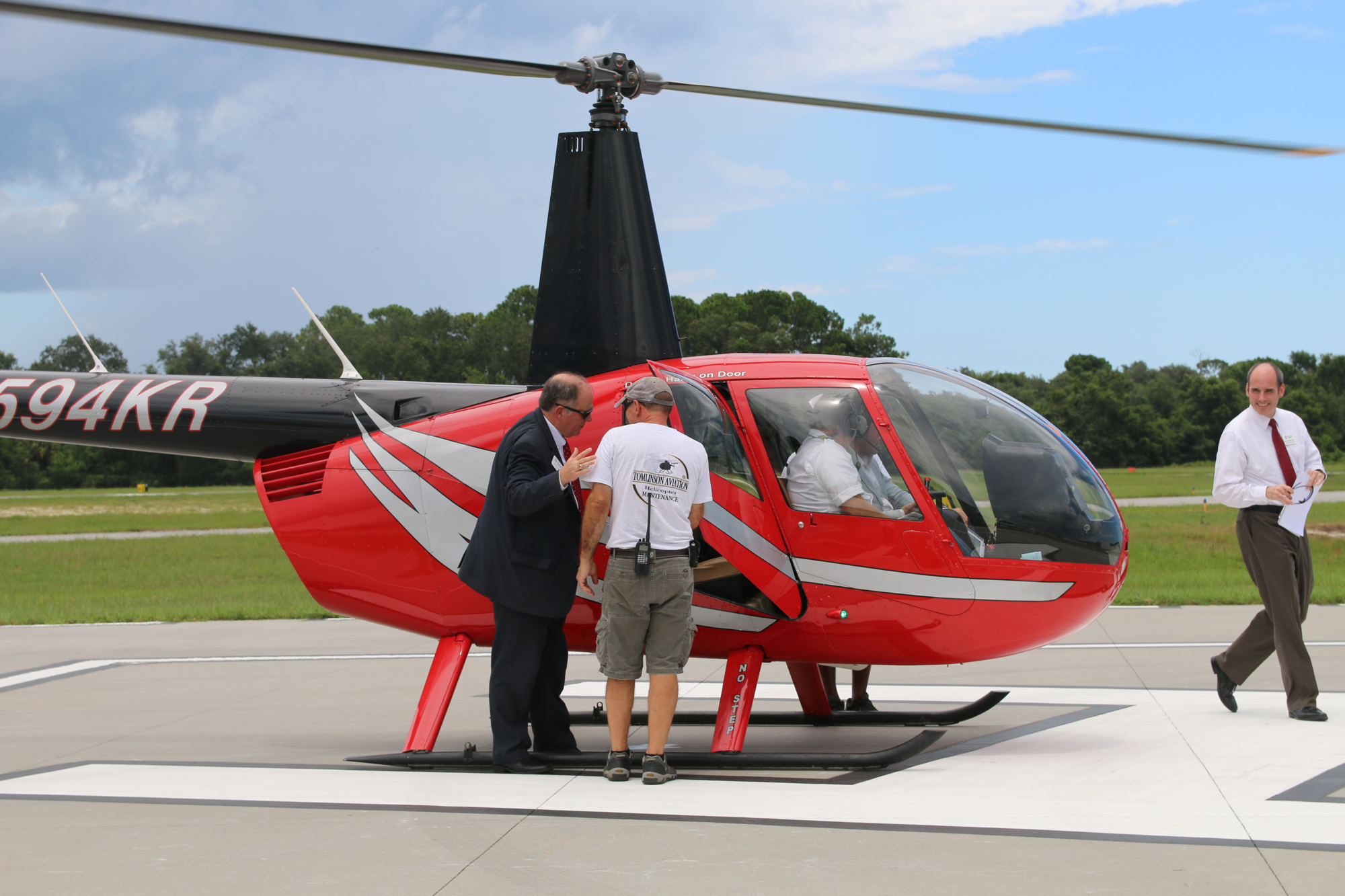 Mayor Bill Partington exits the helicopter at the conclusion of the tour. Photo by Jarleene Almenas