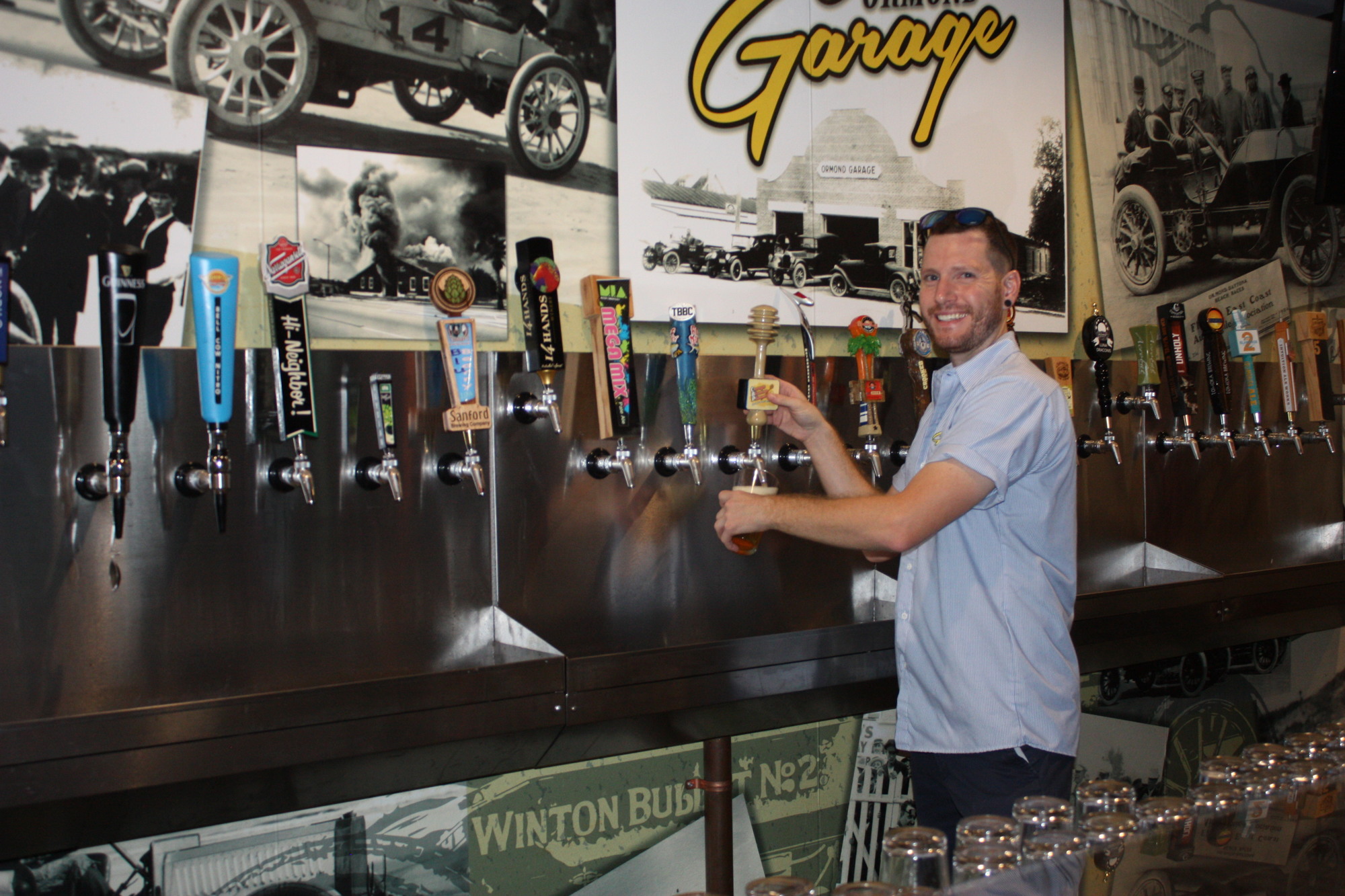 Adam Bolwerk, head brewer, pours a pint at Ormond Garage Brewing. Photo by Wayne Grant