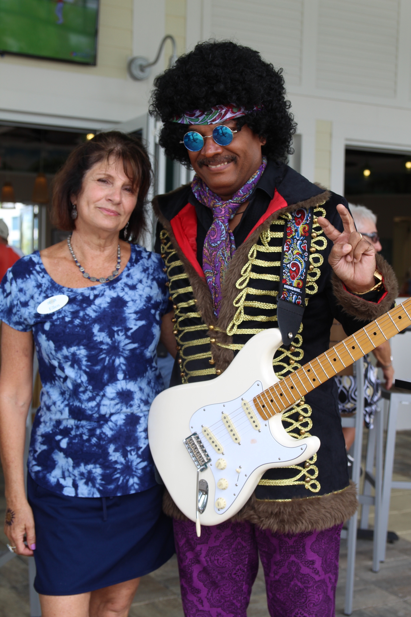Latitude hostess Ellen Money poses with Jimmy Hendrix. She said she loves her job. Photo by Tanya Russo