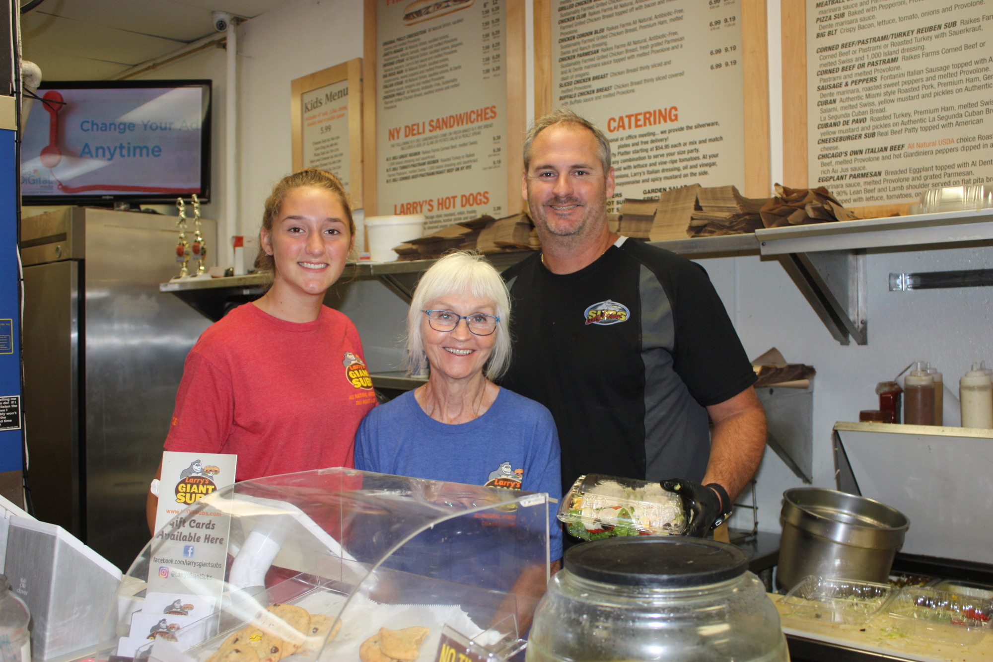 Madison, Carole and Matt Long served food at Larry’s Giant Subs on Labor Day as other places were closed. Photo by Wayne Grant