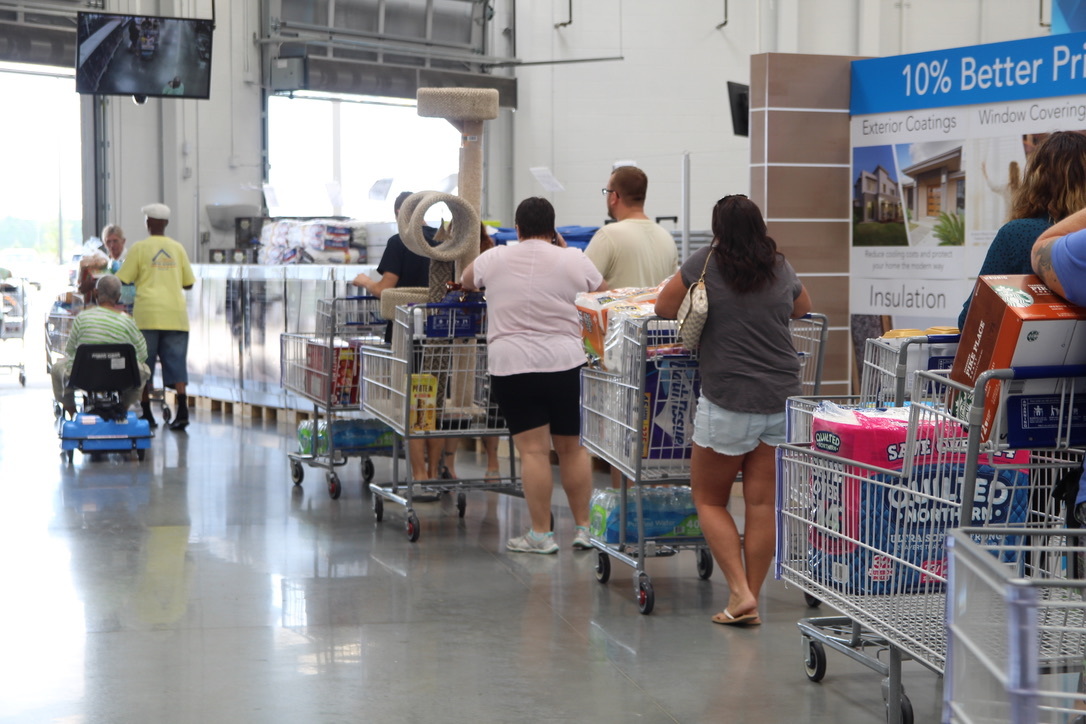 Lines are everywhere at the new Sam's Club, including the one where people go out the door. Photo by Tanya Russo