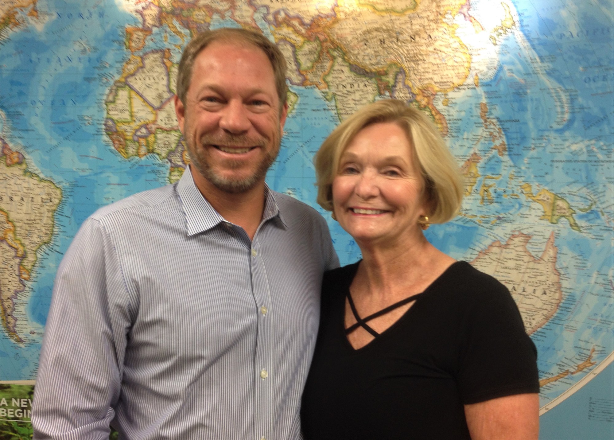John Upchurch and his mother, Karen, have seen growth for their business, Odyssey Travel. Photo by Wayne Grant