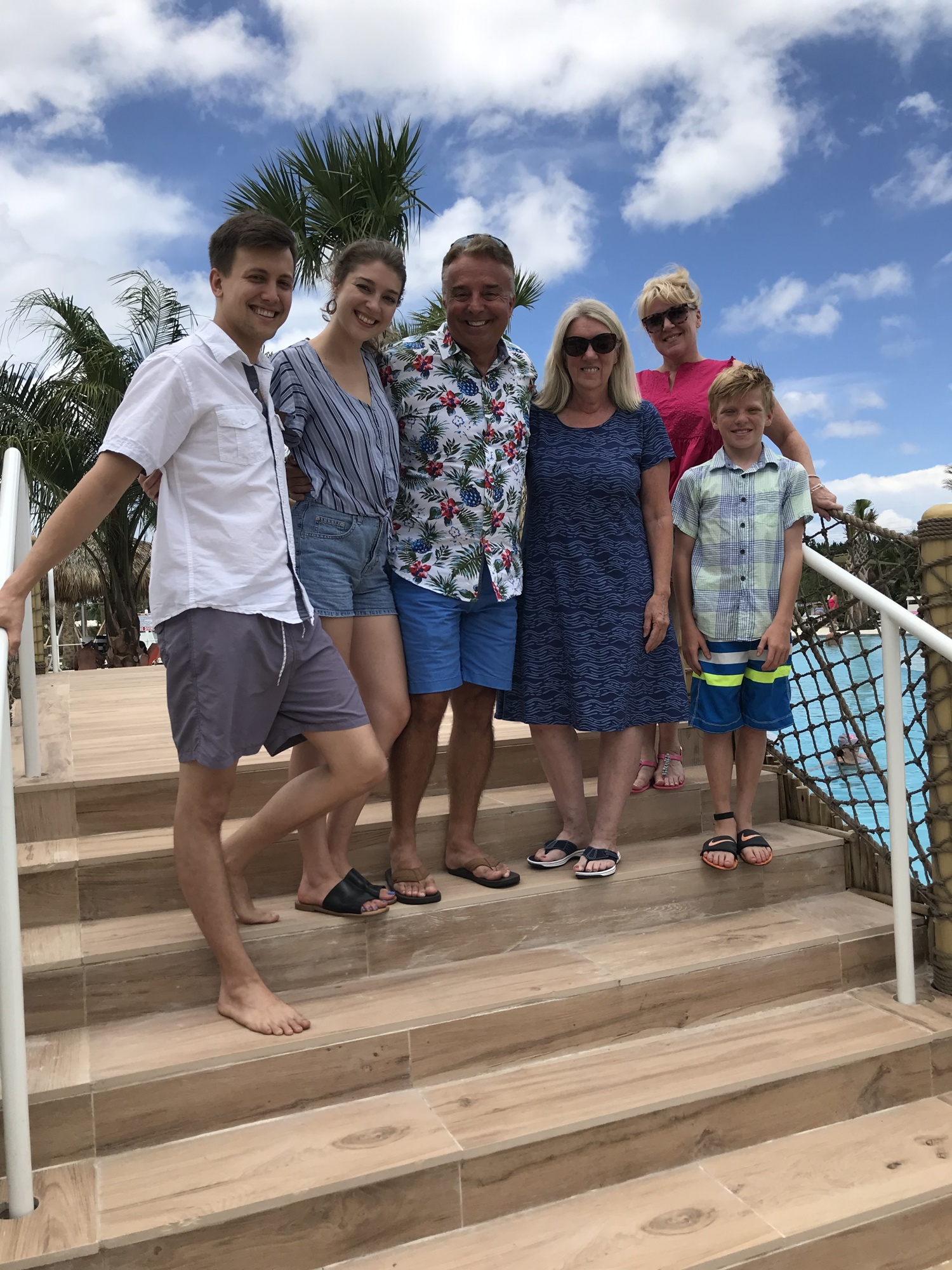 Brenden McNeil, Kaley McNeil, Michael McLean, Lisa  McLean, Jennifer Twilley and Jake Twilley on the bridge over the Latitude Margaritaville community pool. Courtesy photo