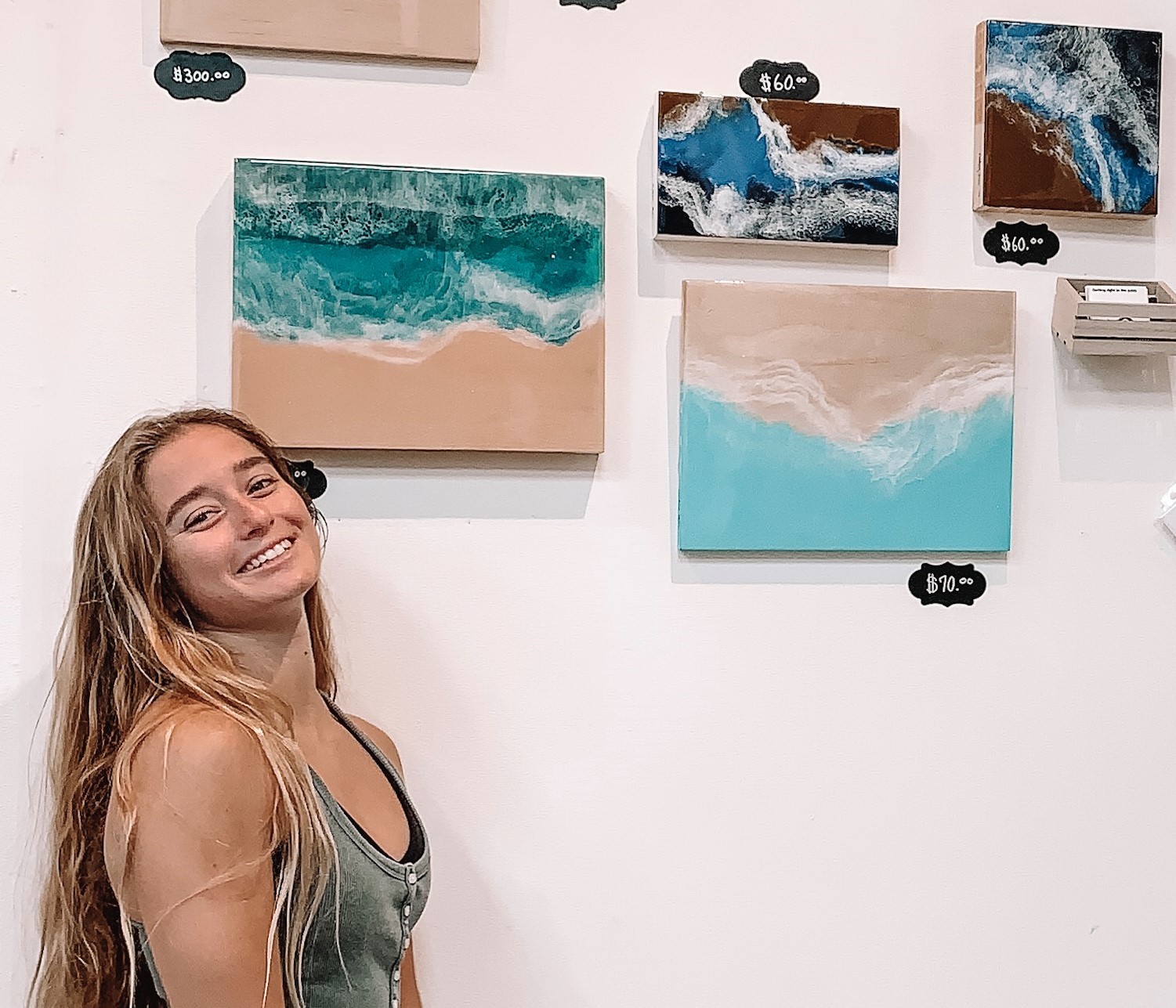 Hailey Nolin creates beach scenes using surf board resin. Courtesy photo
