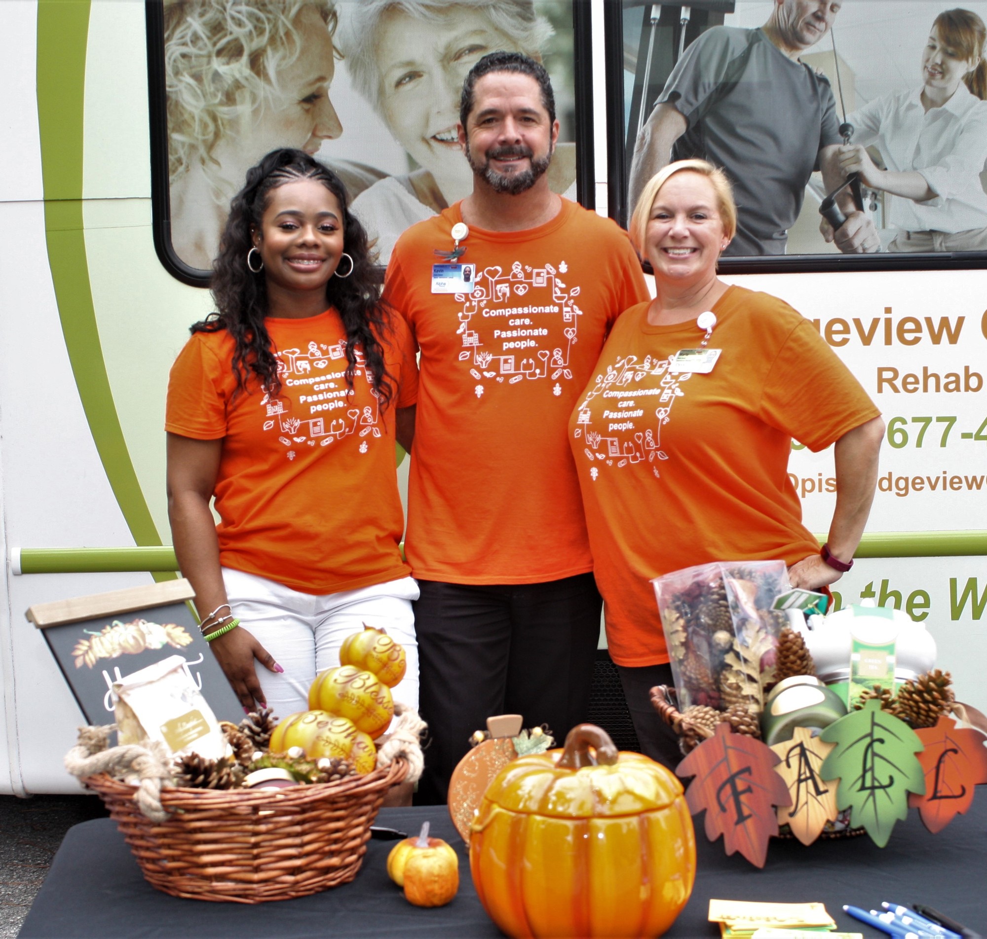 Kevin Dubois, Marla David, Lakeshia Bell, Kevin Dubois and Marla David, of Opis Coquina Center, welcomed people to the Senior Fall Festival. Photo by Wayne Grant