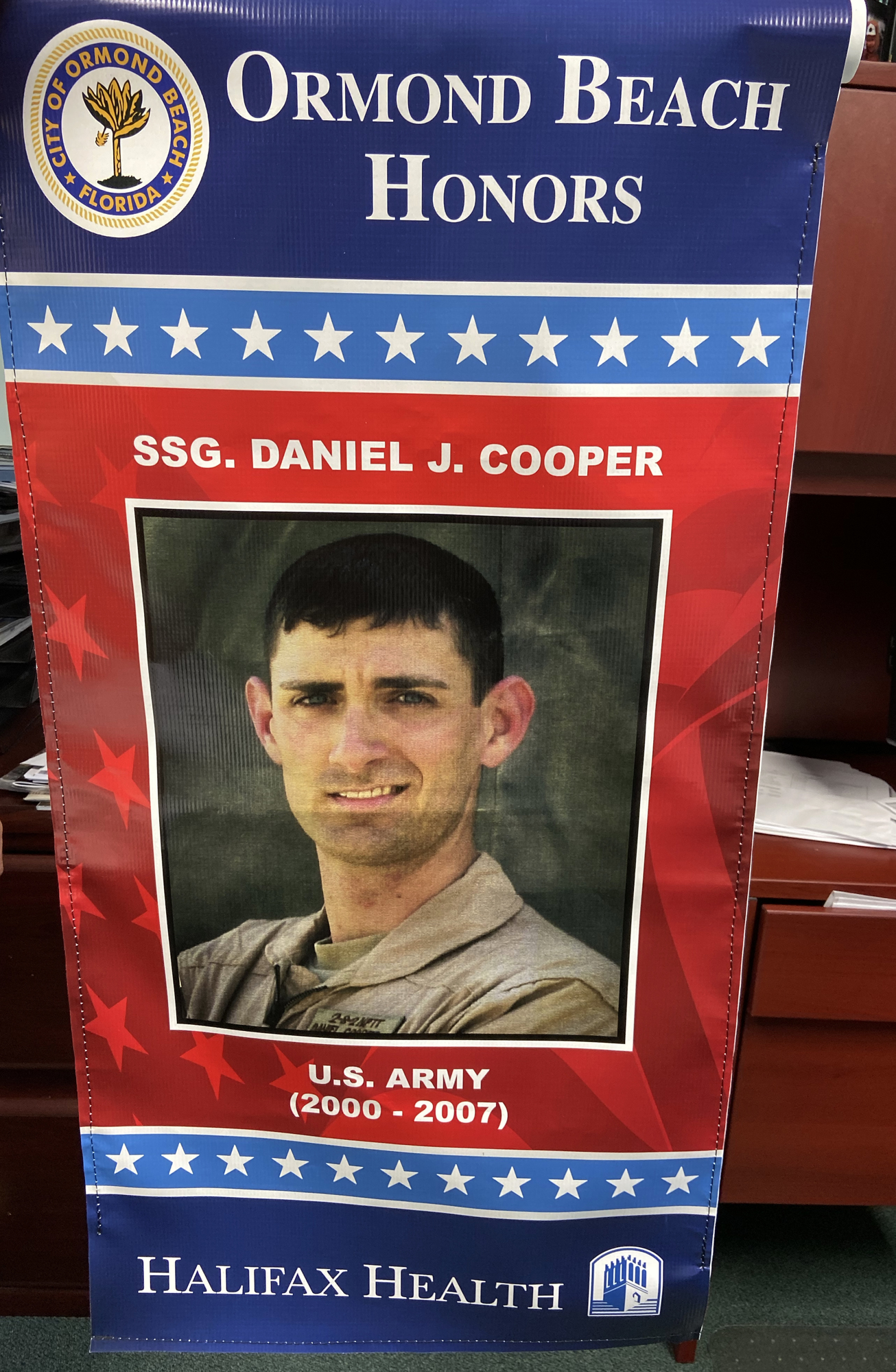 The commemorative banner for Staff Sgt. Daniel Cooper.