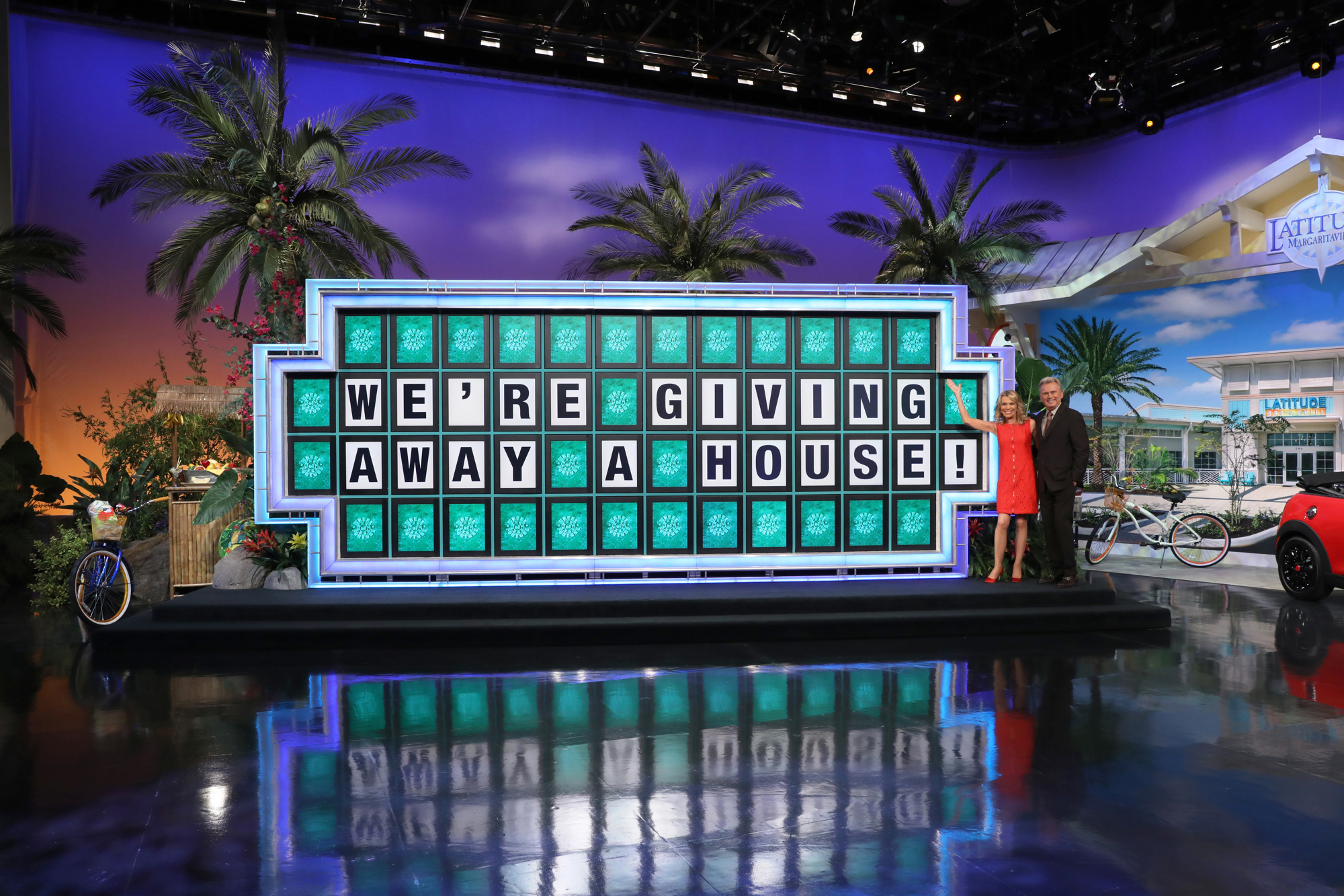 Vanna White and Pat Sajak at Wheel of Fortune puzzleboard. Photo by Carol Kaelson