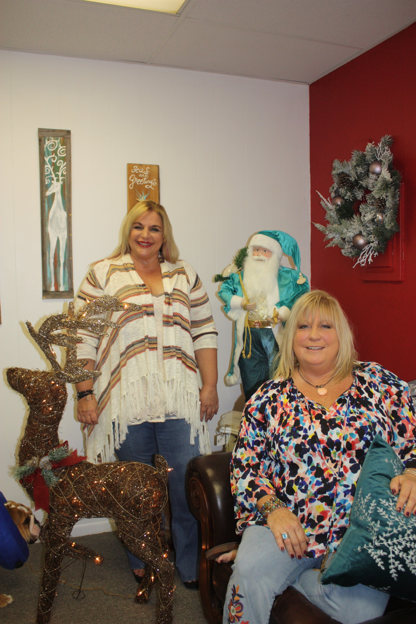 Rochelle Cannon and Angie Vogt are shown in the Christmas Room at Rusty Wagon Art & Funky Furniture Redo Joint. Photo by Wayne Grant