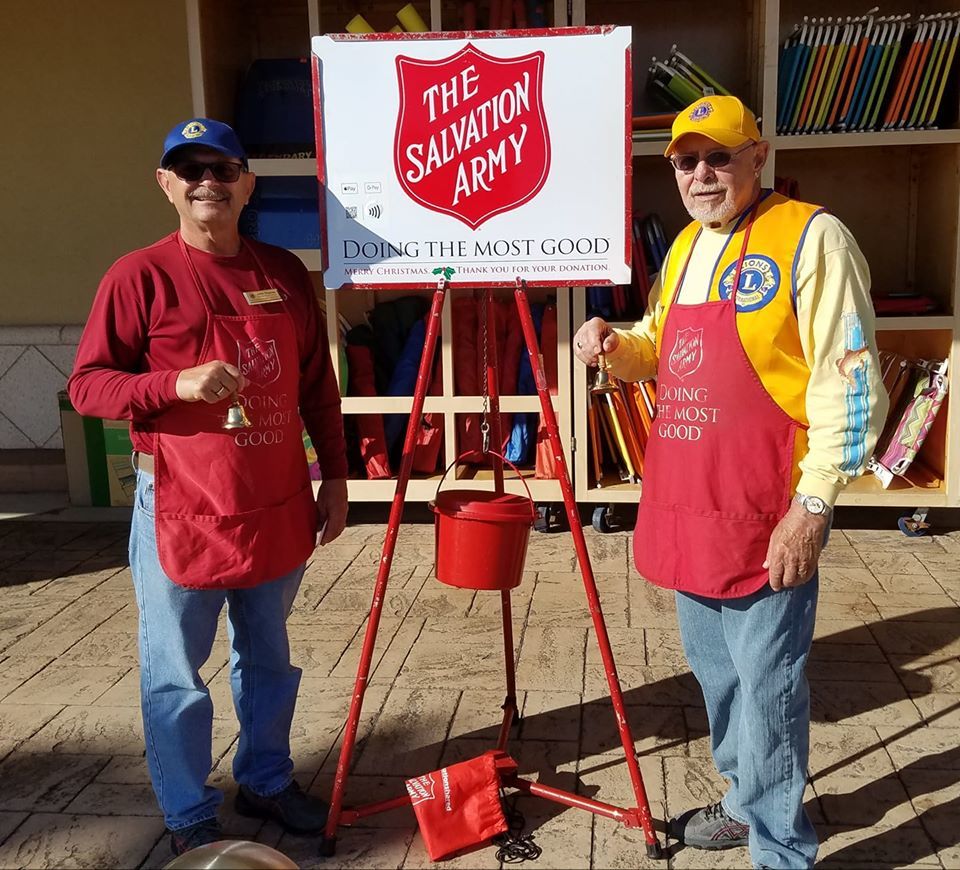 OBTS Lions Club Members John Thomas and Gerry Bandola ring the Salvation Army bell. Courtesy photo