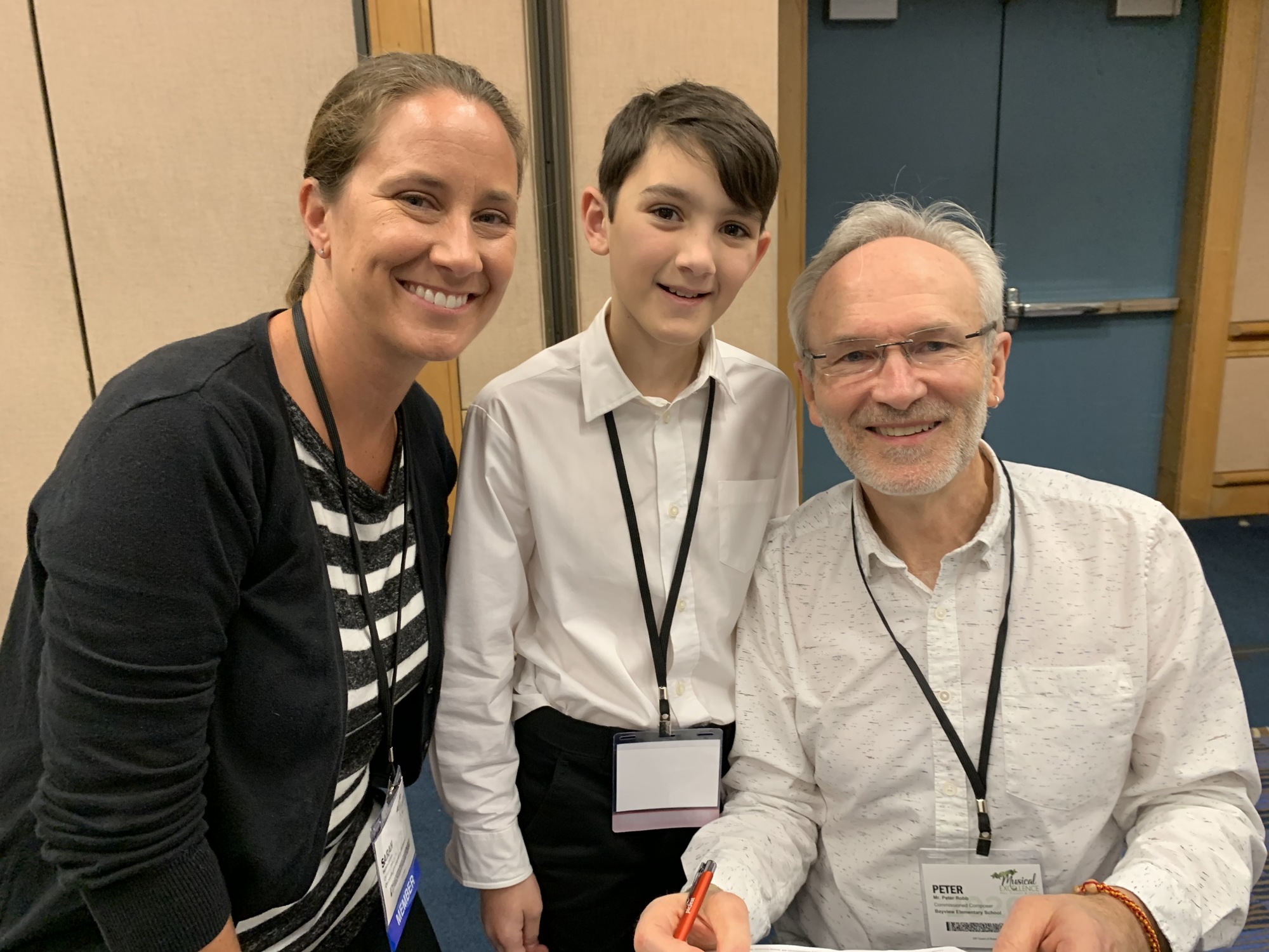 Osceola Elementary School music teacher Sarah Johns, Jack Simpson at Composer Peter Robb  at the Florida Elementary Music Teacher’s Association’s yearly convention in Tampa in early January. Courtesy photo