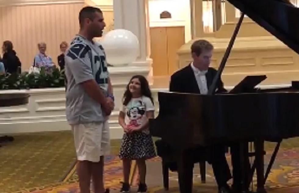 A screenshot of Justin Gigliello singing inside Disney's Grand Floridian Resort in 2019 as his daughter Lyla watches. Watch the video at https://youtu.be/i4_nDyjDVIs. Courtesy photo