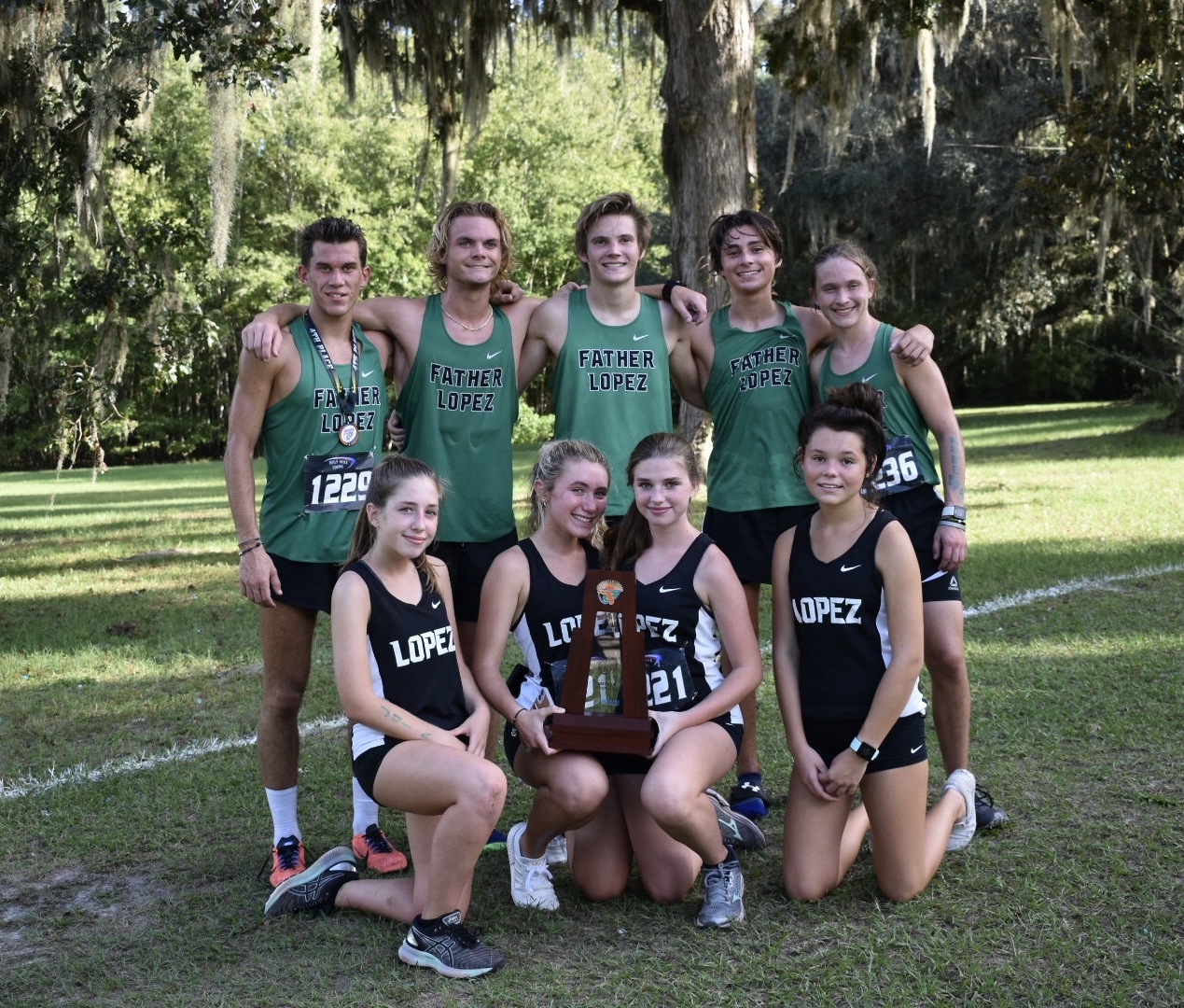 The Father Lopez Cross Country boys team won third at the district level, led by Seth Augustynowski. The girls team won second, led by Mary Pec. Courtesy photo