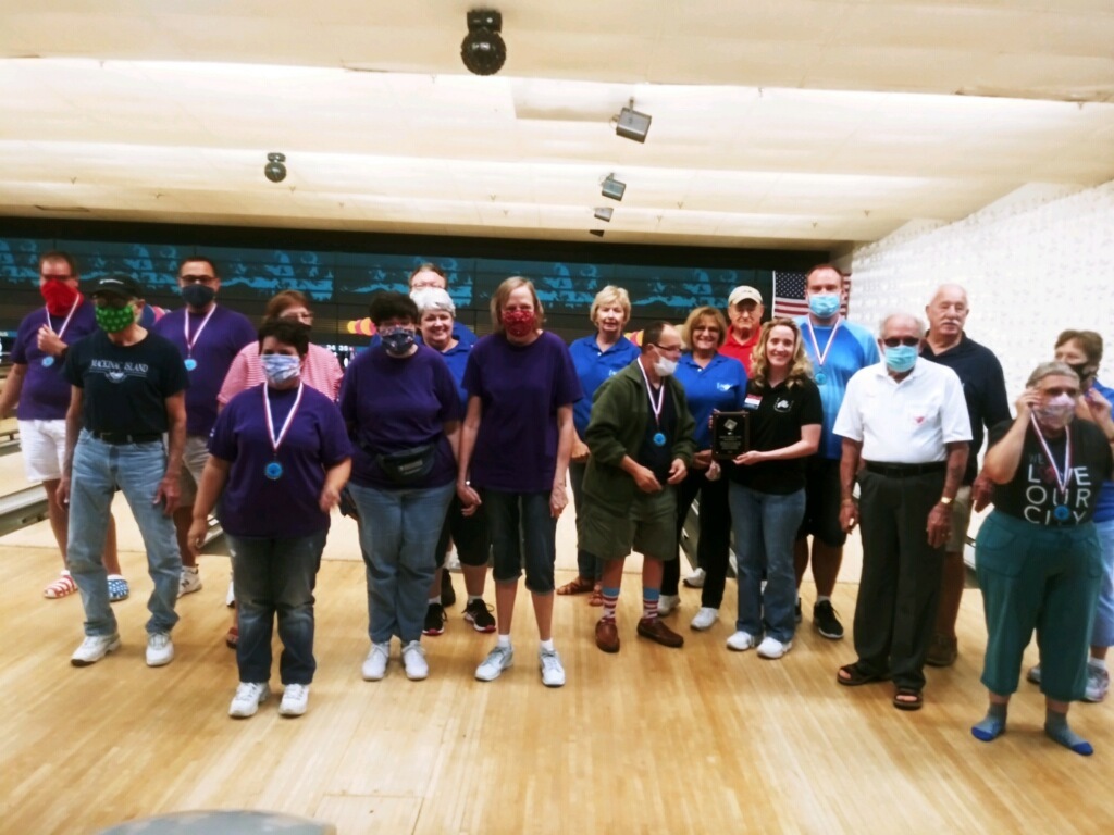 The Fun Time Bowlers present an award to Erica Barger, vice president of the Elks Lodge East Central District. Courtesy photo