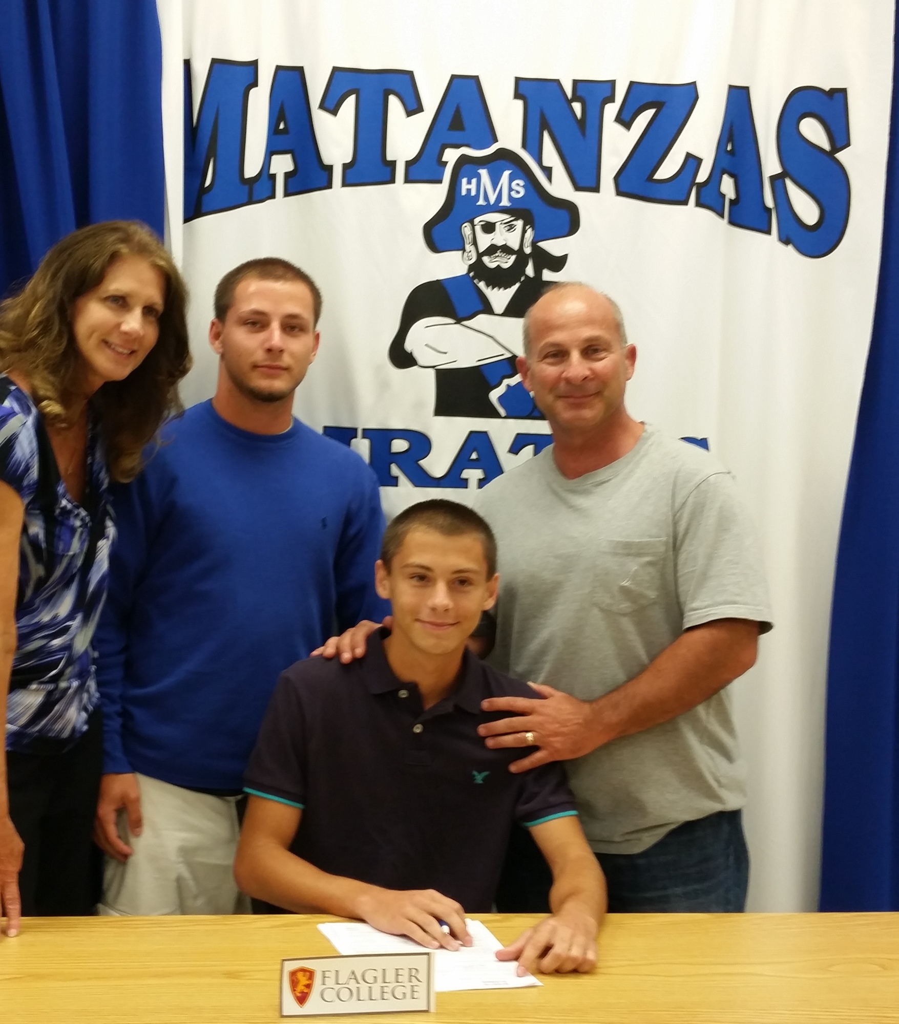 Anthony Colasanti signs to run with Flagler College. Courtesy photo