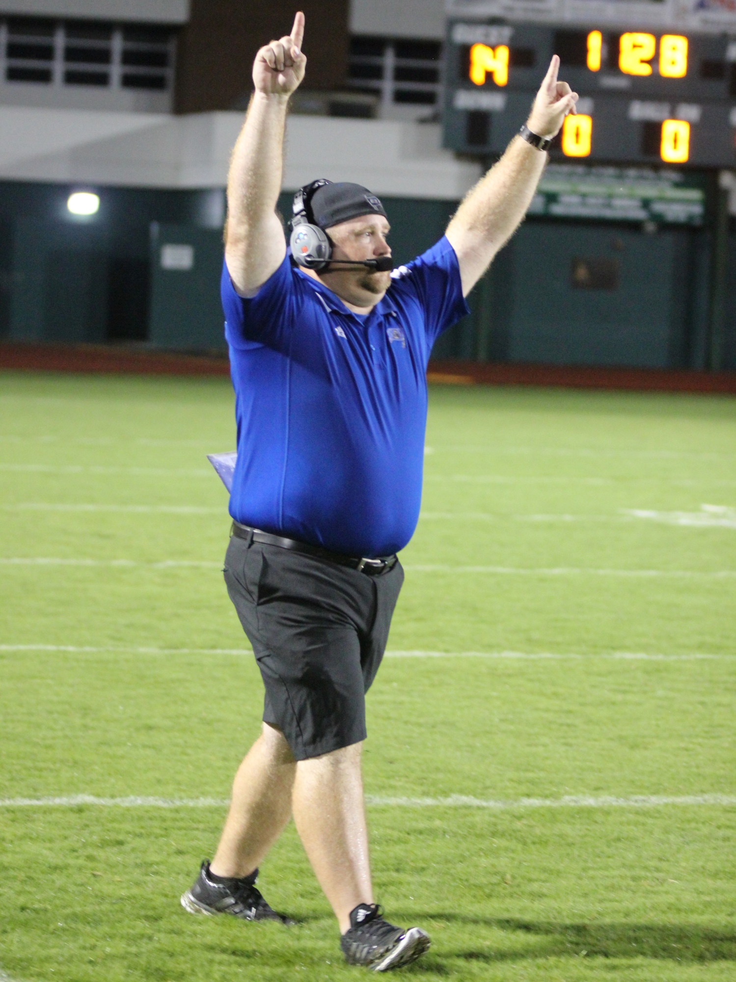 Coach Robert Ripley holds his hands up, after Matanzas makes the final stop against FPC.