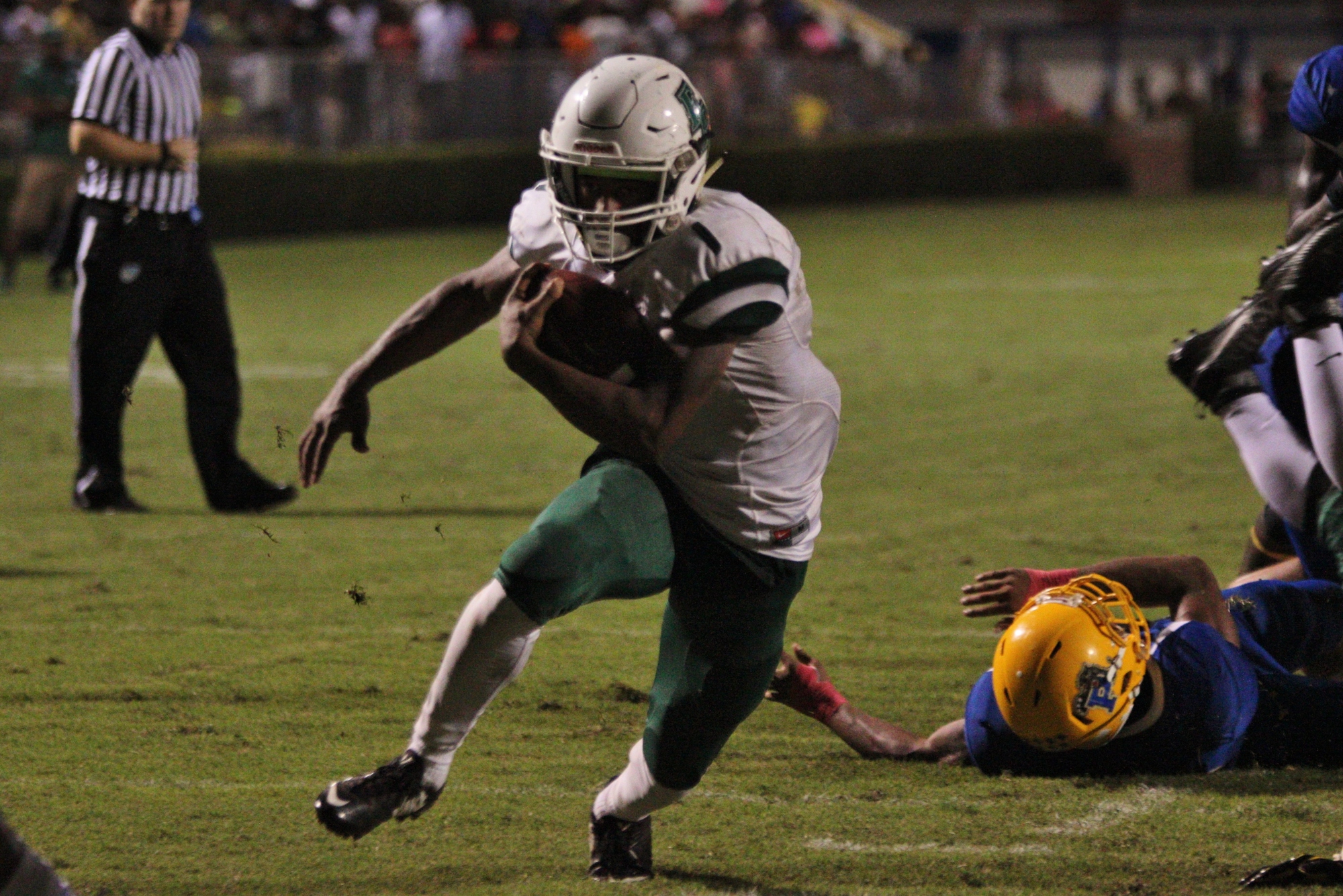 Que'Shaun Byrd refuses to go down during his fourth-down touchdown to give FPC the lead. Photos by Jeff Dawsey