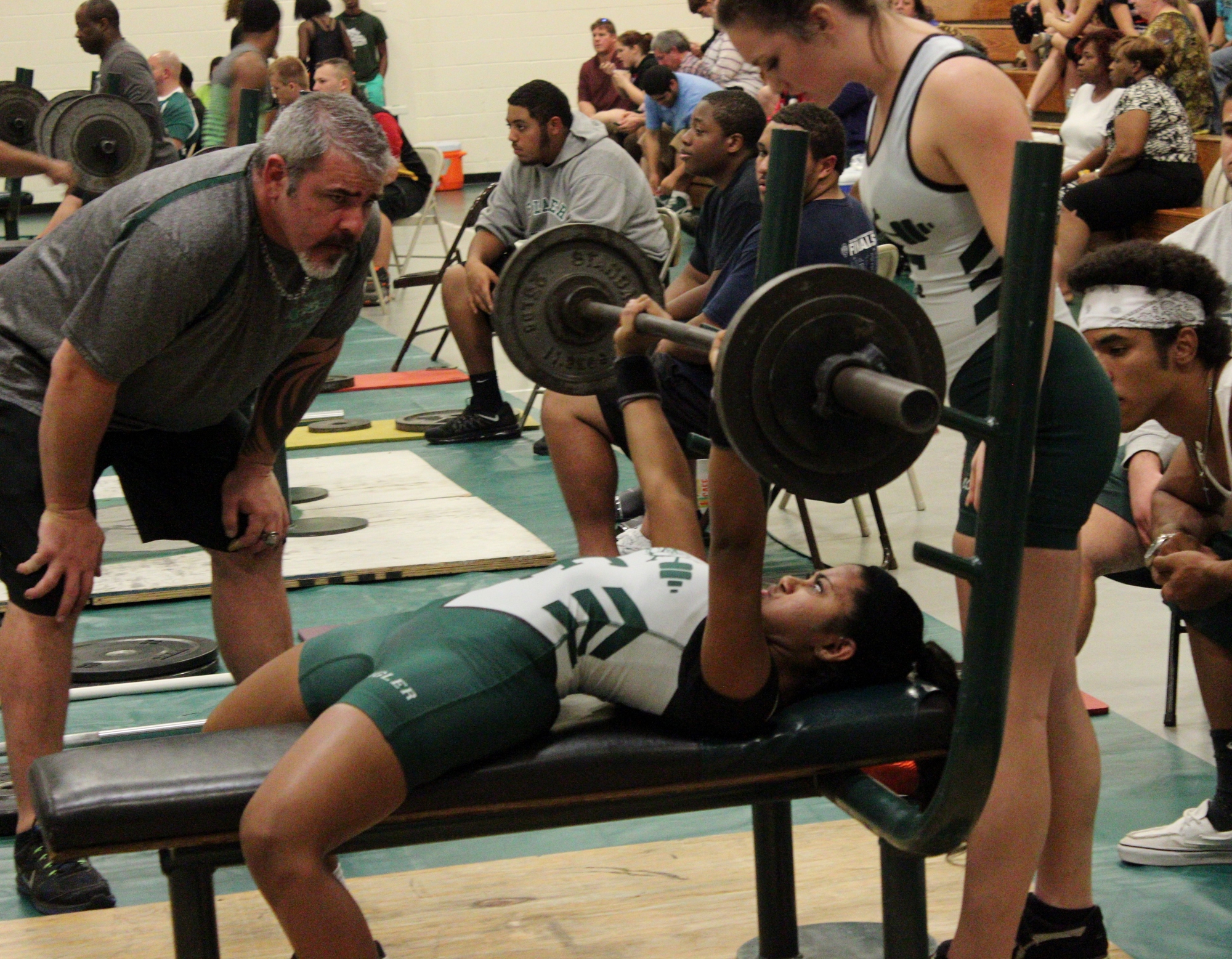 Tiara Sanker broke the school bench record with 110 pounds.