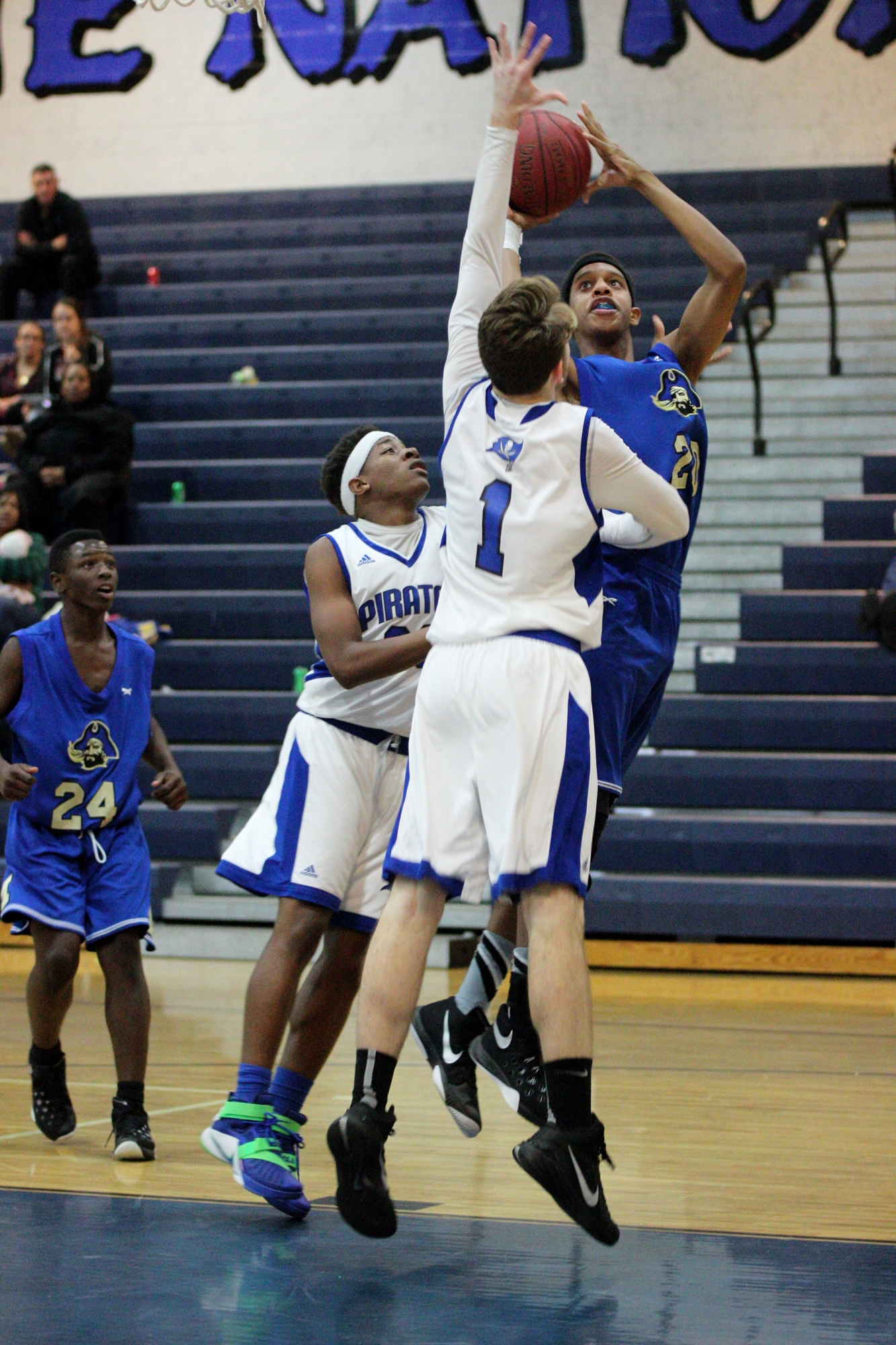 Goodwin gets his hand on a second shot for a block.