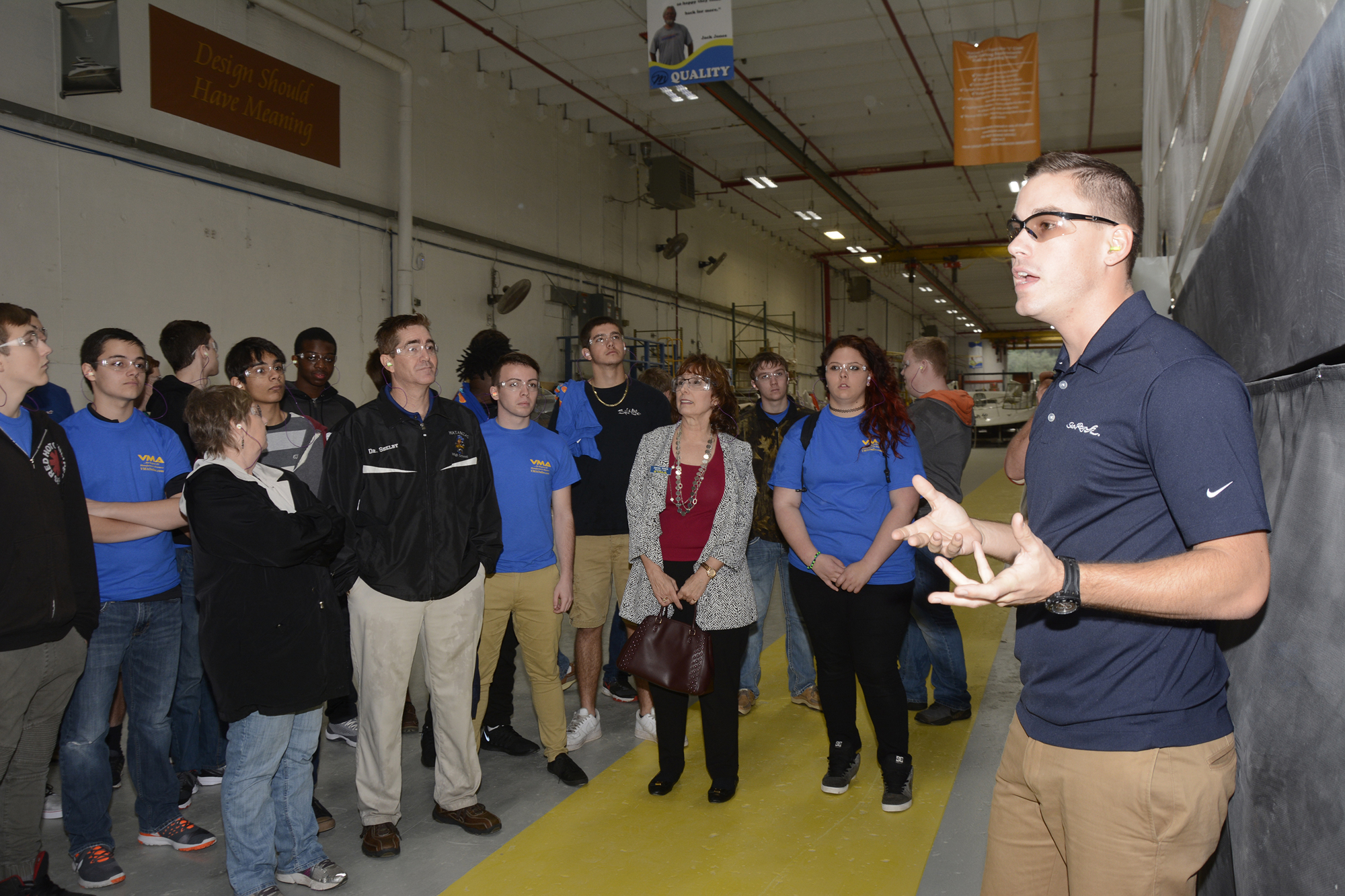 SeaRay Boats Lamination Trainer Chris Lamb gives the students an educational tour of the facility.
