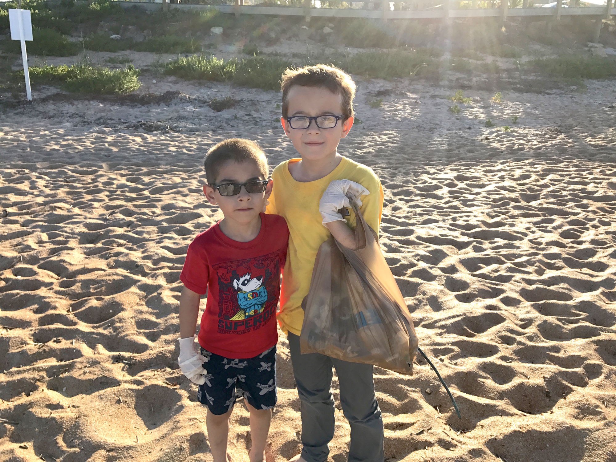 Ivan Cheban and Nikita Boychev helped with the beach cleanup efforts led by Old Kings Elementary School. Photo courtesy of Old Kings Elementary