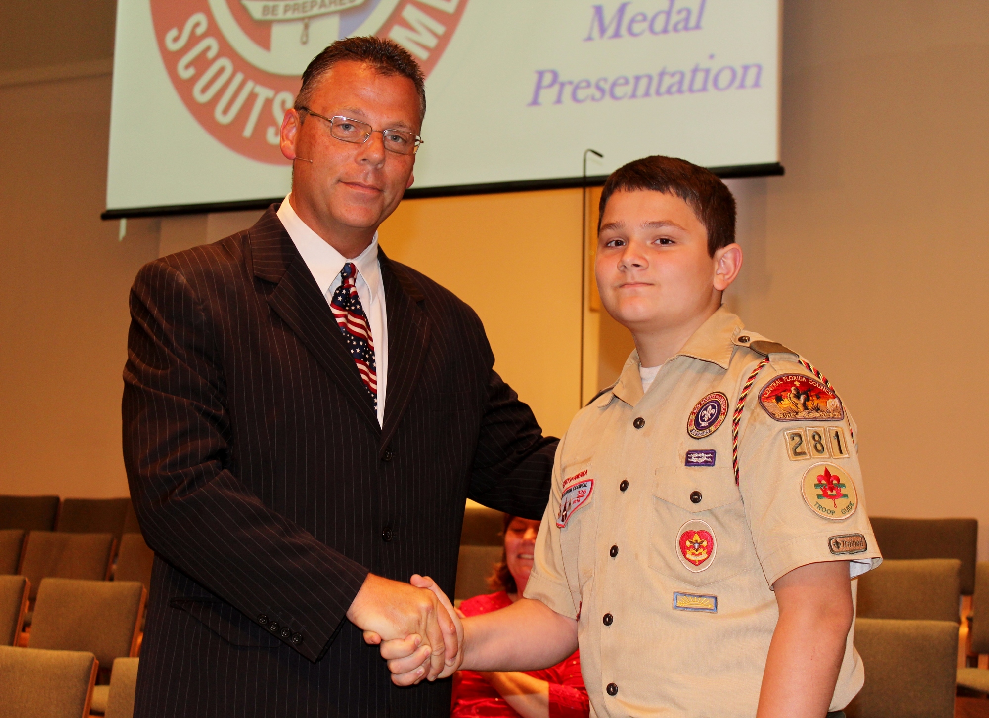 Pastor Kevin Lautar, senior pastor at First Baptist Church of Palm Coast, with Boy Scout Jacob Schichtel. Photo by Jeff Dawsey