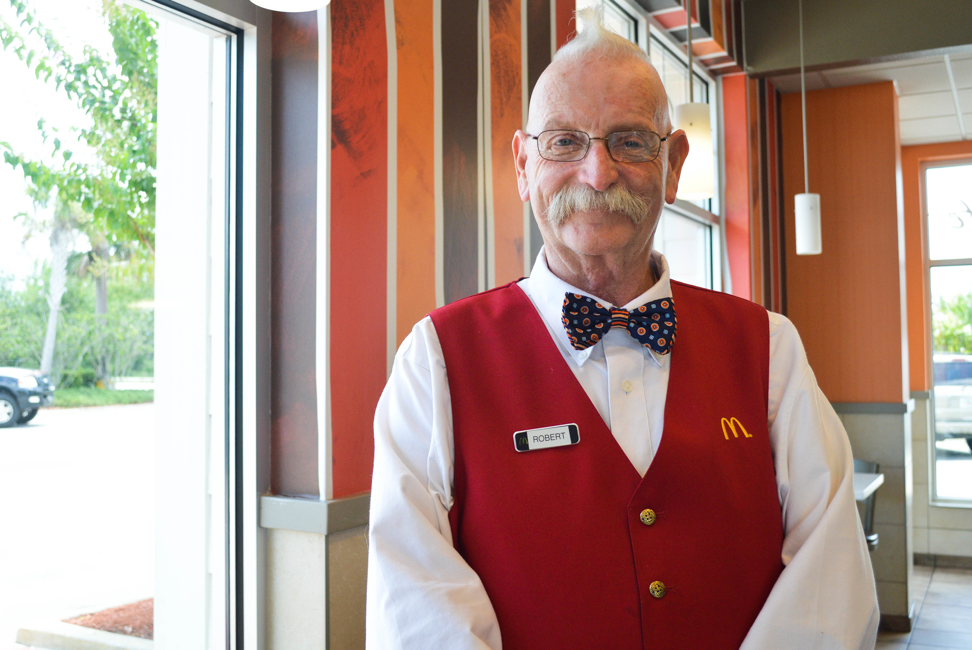 Robert MacDonald, 66, works at the McDonald's at 5190 State Road 100. Photo by Paige Wilson