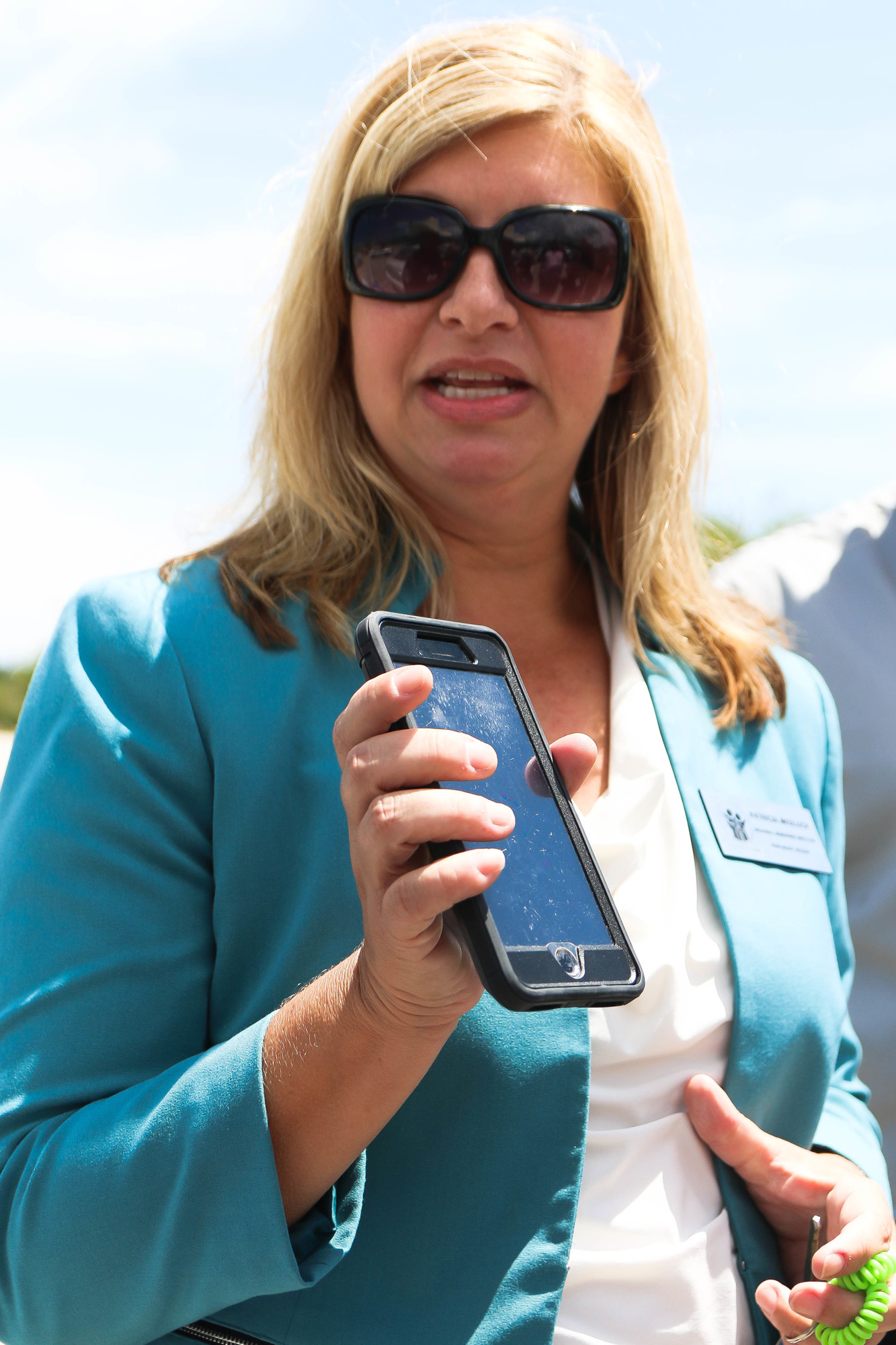 Patricia Medlock, DCF northeast regional managing director, encourages drivers to place their phones in the backseat, as a reminder to check it before exiting a car. Photo by Paige Wilson