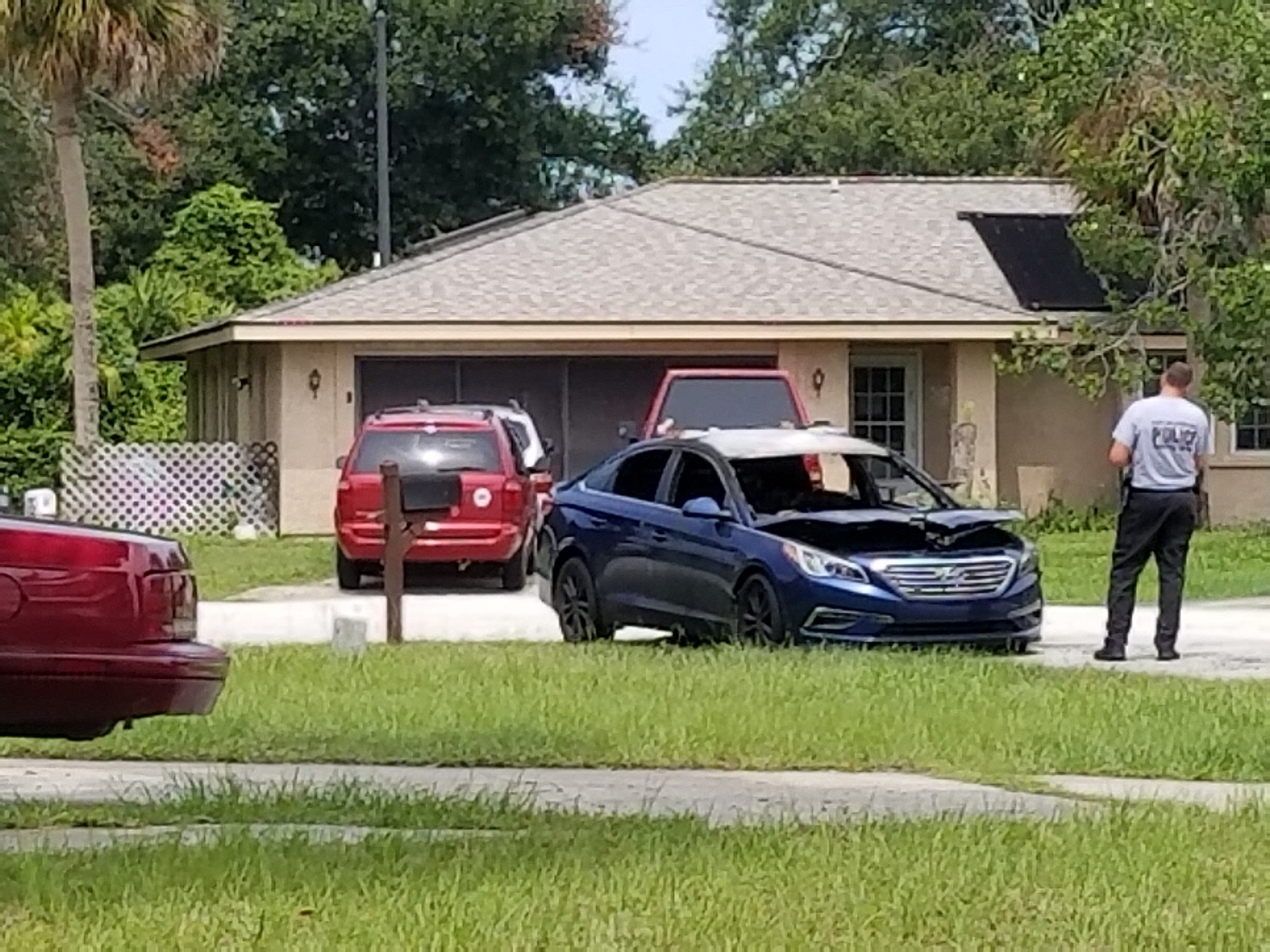 The blue car that was set on fire at Blair Court. Photo courtesy of the Flagler County Sheriff's Office