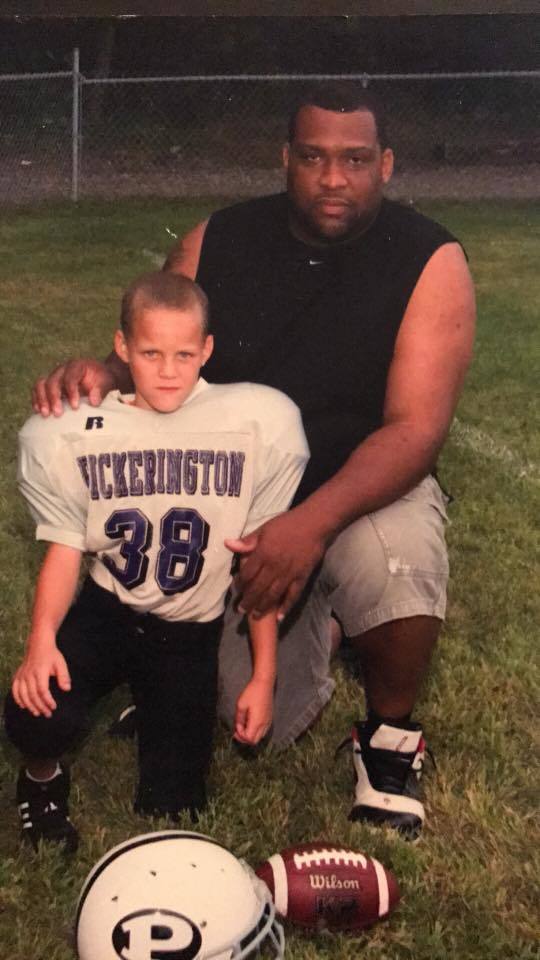 Verneal Henshaw (left) and his father, Verneal Sr., after a little league football game. Photo courtesy of Verneal Henshaw Sr.