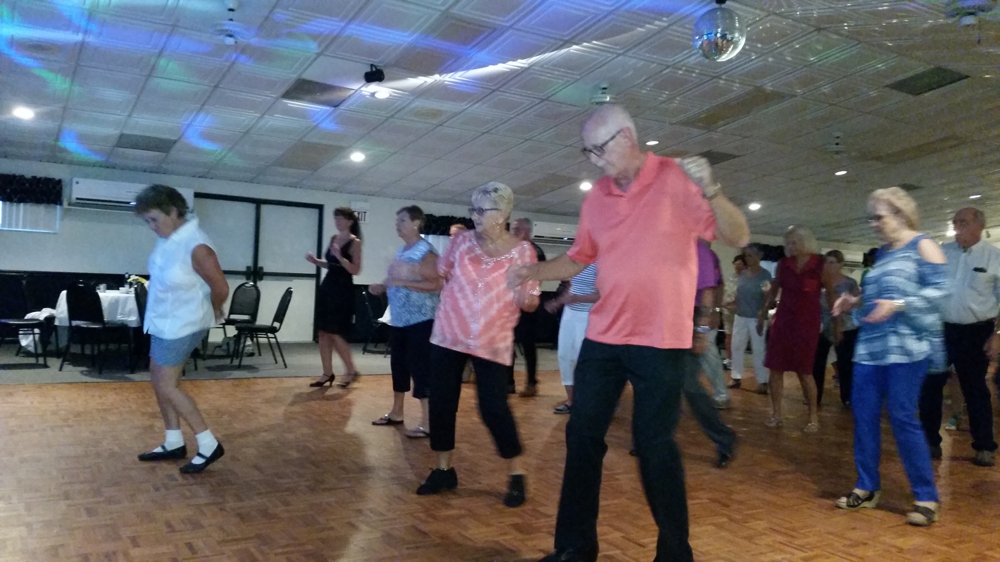 Columbian Club members Kit Schiller, Rose Rowe and Rich Rowe line dance during the fundraiser. Photo courtesy of Kit Schiller
