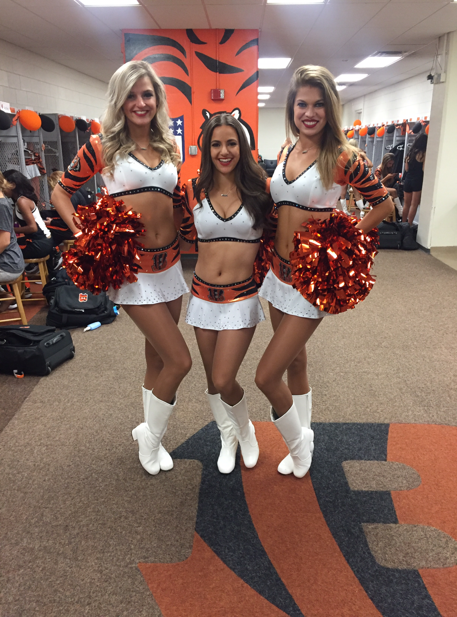 Jaclyn DeAugustino (middle) in the locker room with fellow Bengals cheerleaders. Photo courtesy of Jaclyn DeAugustino