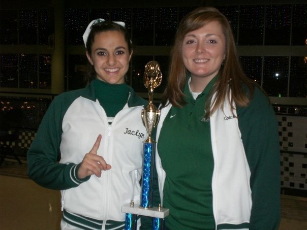 Jaclyn DeAugustino (left) poses with an award she won while cheerleading at FPC. Photo courtesy of Steve DeAugustino