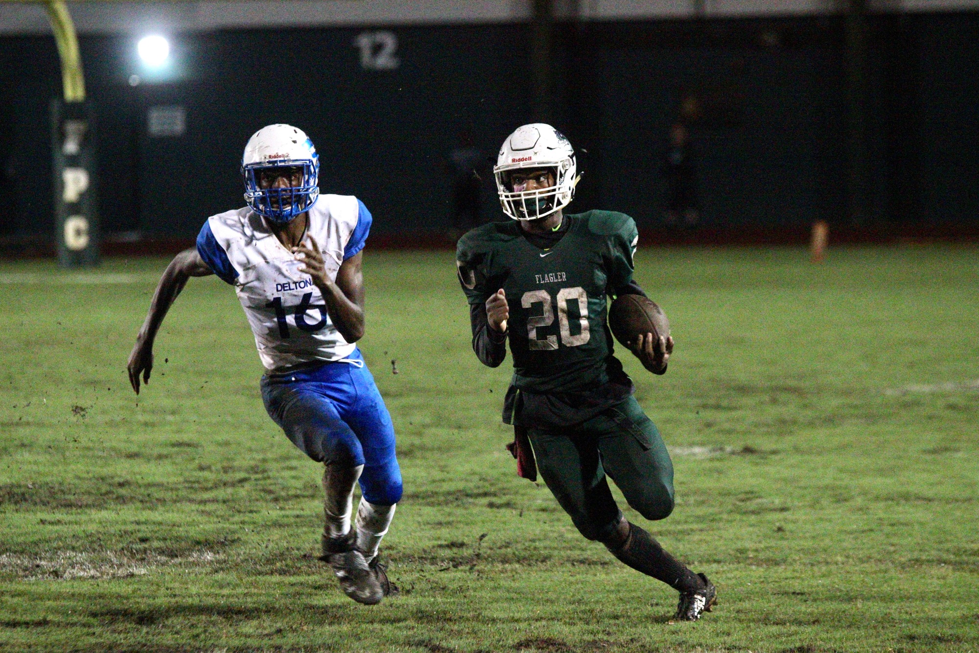 FPC defensive back Damien Irven returns a punt. Irven's pick six in the fourth quarter gave the Bulldogs their first lead of the game. Photo by Ray Boone