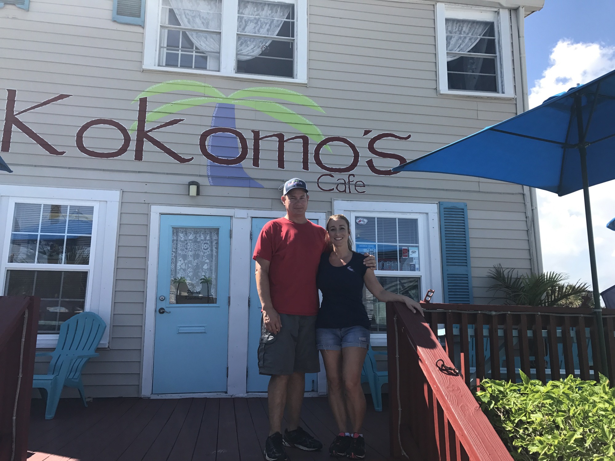 Greg Taylor (left) and his wife, Christy, in front of their restaurant, Kokomo's Cafe. Photo courtesy of Christy Taylor