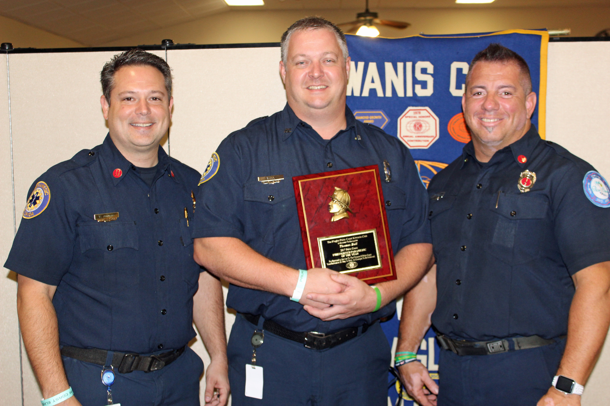 Palm Coast Firefighter-Paramedic Thomas Bull (center) is congratulated for selection as the Flagler-Palm Coast Kiwanis Club’s 2017 Firefighter of the Year by Capt. Thomas Ascone and Lt. Jeffrey Poeira. Photo courtesy of Cindi Lane