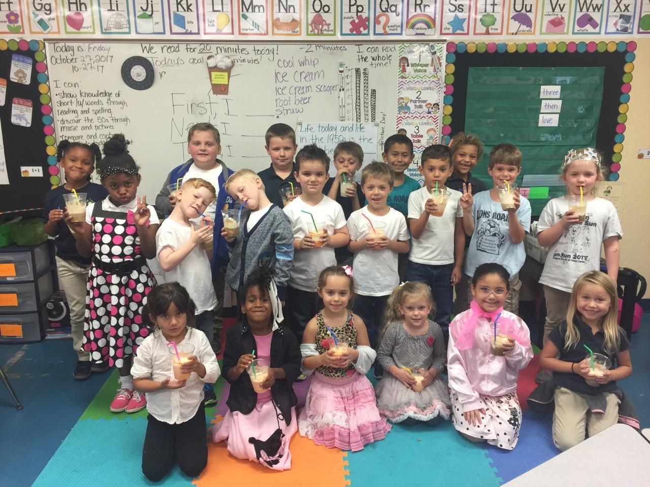 Imagine School at Town Center first-graders in Rachael Spires' class celebrate the 50th day of school with themed attire for the 1950s. Photo courtesy of LaToya Taite