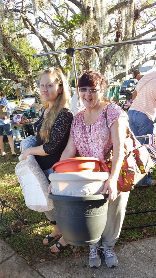 Kristy Pellegrino and her mother Terri Diamond enjoy their time at the yard sale benefit the Community Cats of Palm Coast. Photo courtesy of Community Cats of Palm Coast