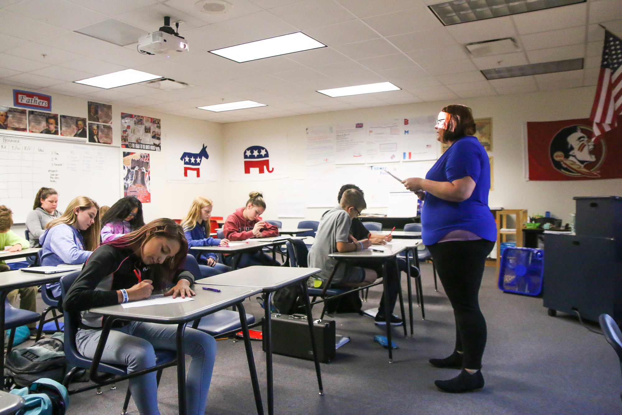 Erica Scudder teaches a seventh-grade advanced civics class. Photo by Paige Wilson