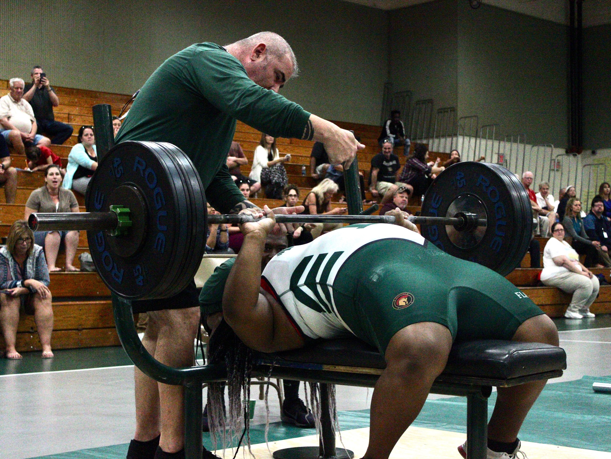 FPC coach Duane Hagstrom and lifter Lexi Buchanan during the bench press. Photo by Ray Boone