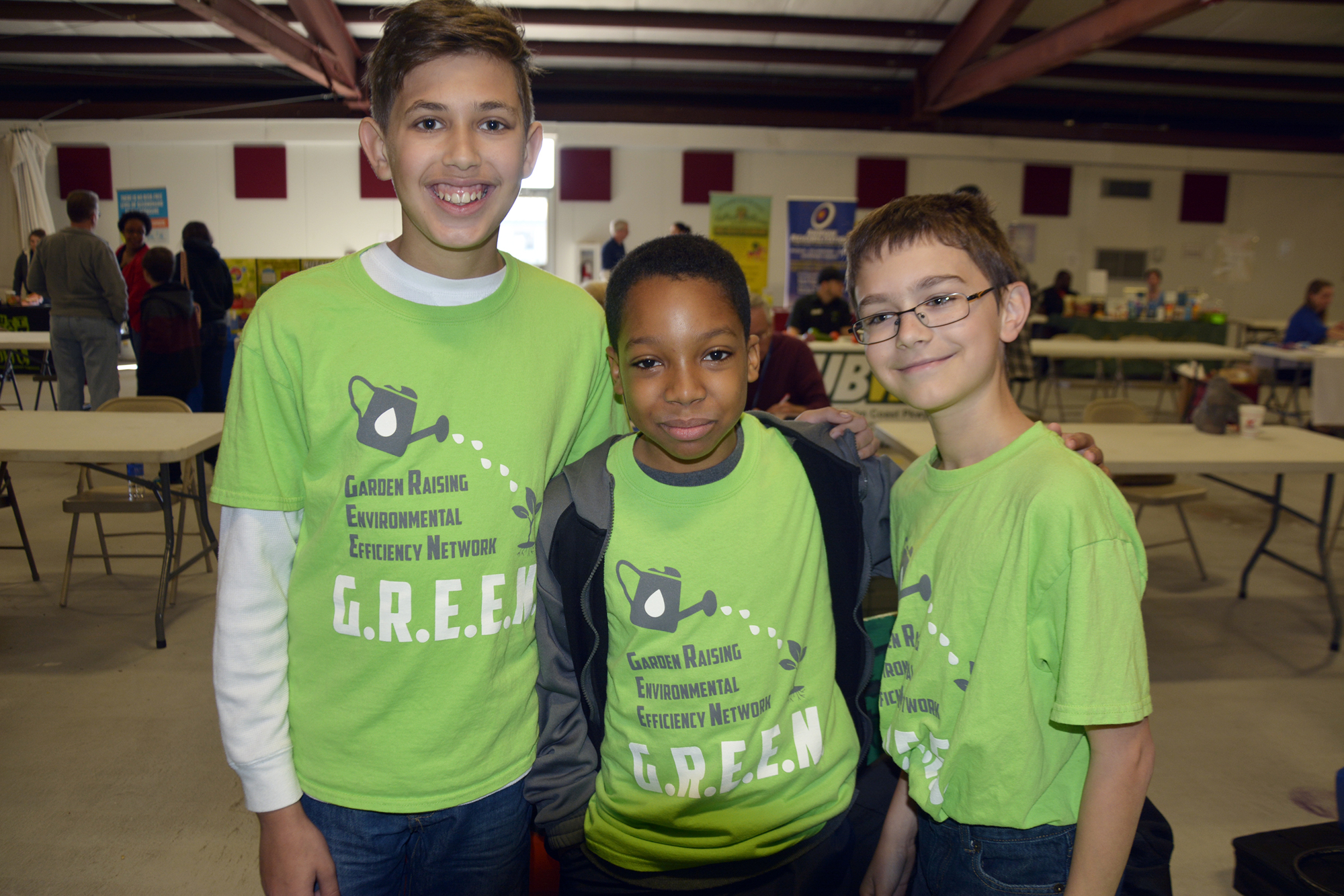 Bunnell Elementry School students Danny Wolcott, Jermaine Bucknor and Jackson McMillan set up a booth at the BTES Health Fair to bring awareness to the Flagler County families in need with their Garden Raising Environmental Efficiency Network. (G.R.E.E.N.