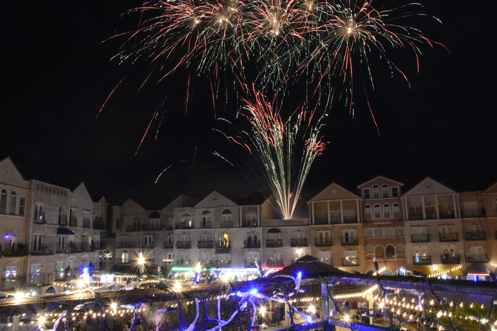 Residents were seen scattered among the balconies and onlookers ventured outside of the restaurants to gawk at the beautiful display of fireworks above the village. Photo by Anastasia Pagello