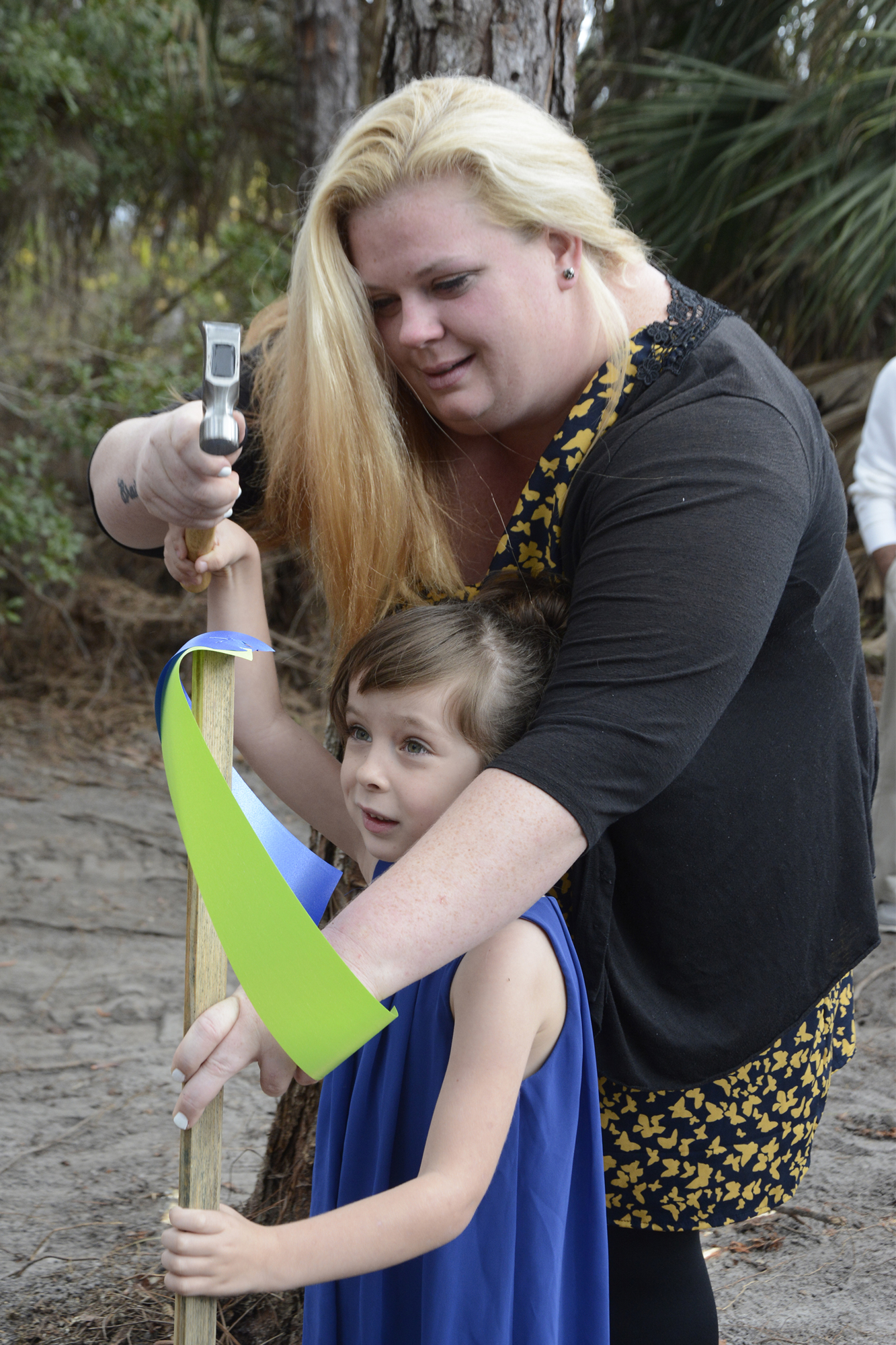 The fourth stake was set in place to honor the home recipients Christina Whitaker and her daughter Kaydence Bliss.
