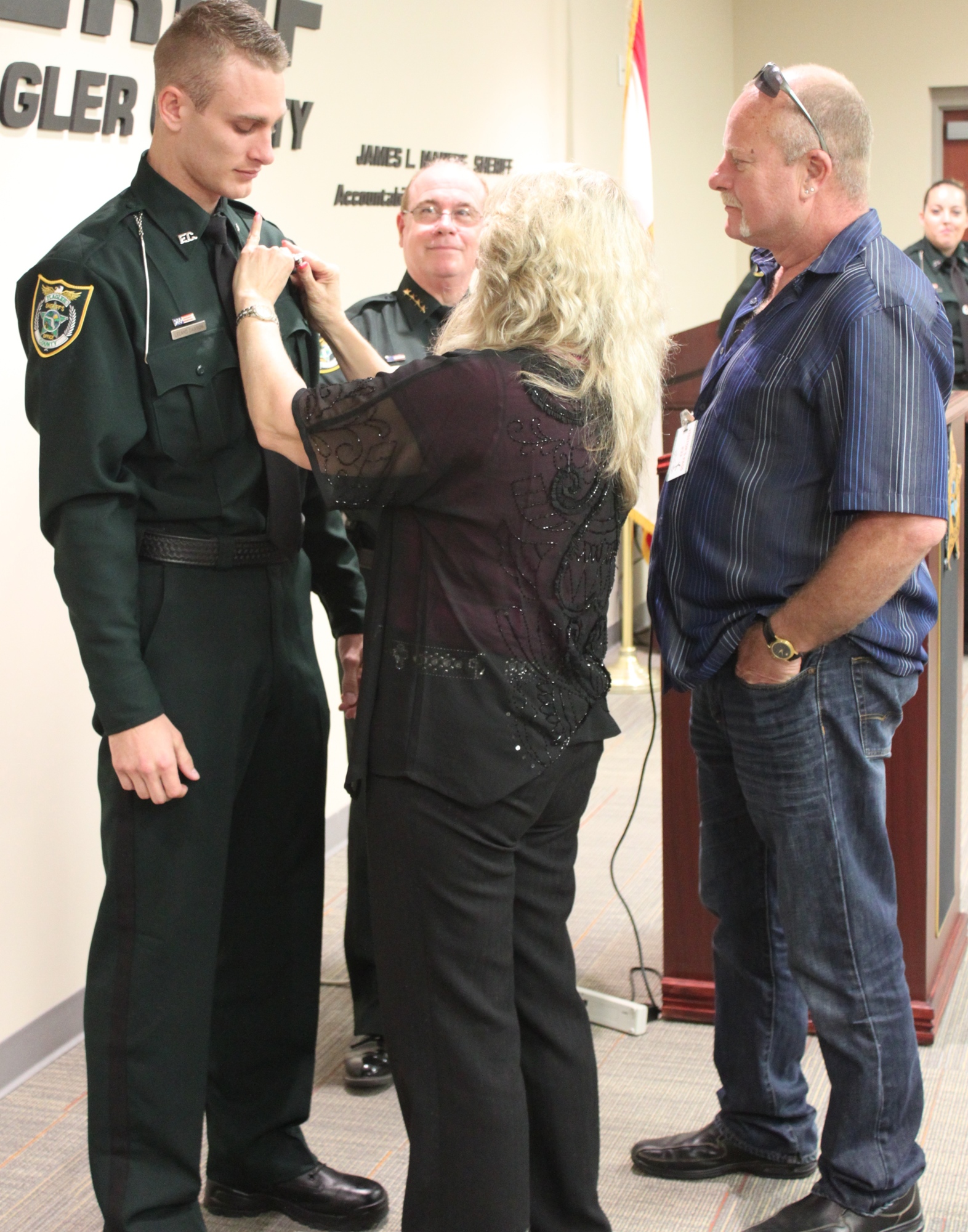 Deputy Leland Dawson's parents, Toni Dawson and Leland V. Dawson, attended his swearing-in ceremony March 2 at the Sheriff’s Operations Center. (Photo courtesy of the Flagler County Sheriff's Office)