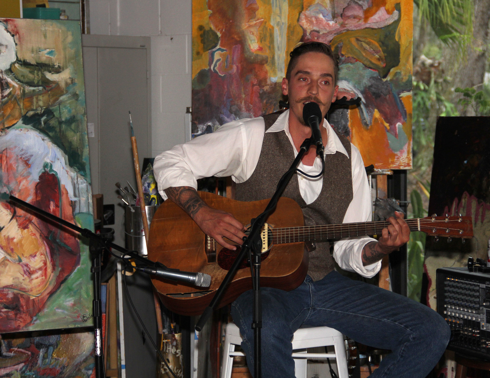 Live music was provided by Jake Cox at the Salvo Art opening to celebrate Linda Solomon's life on Saturday, Marchh 19. Photo by Jacque Este