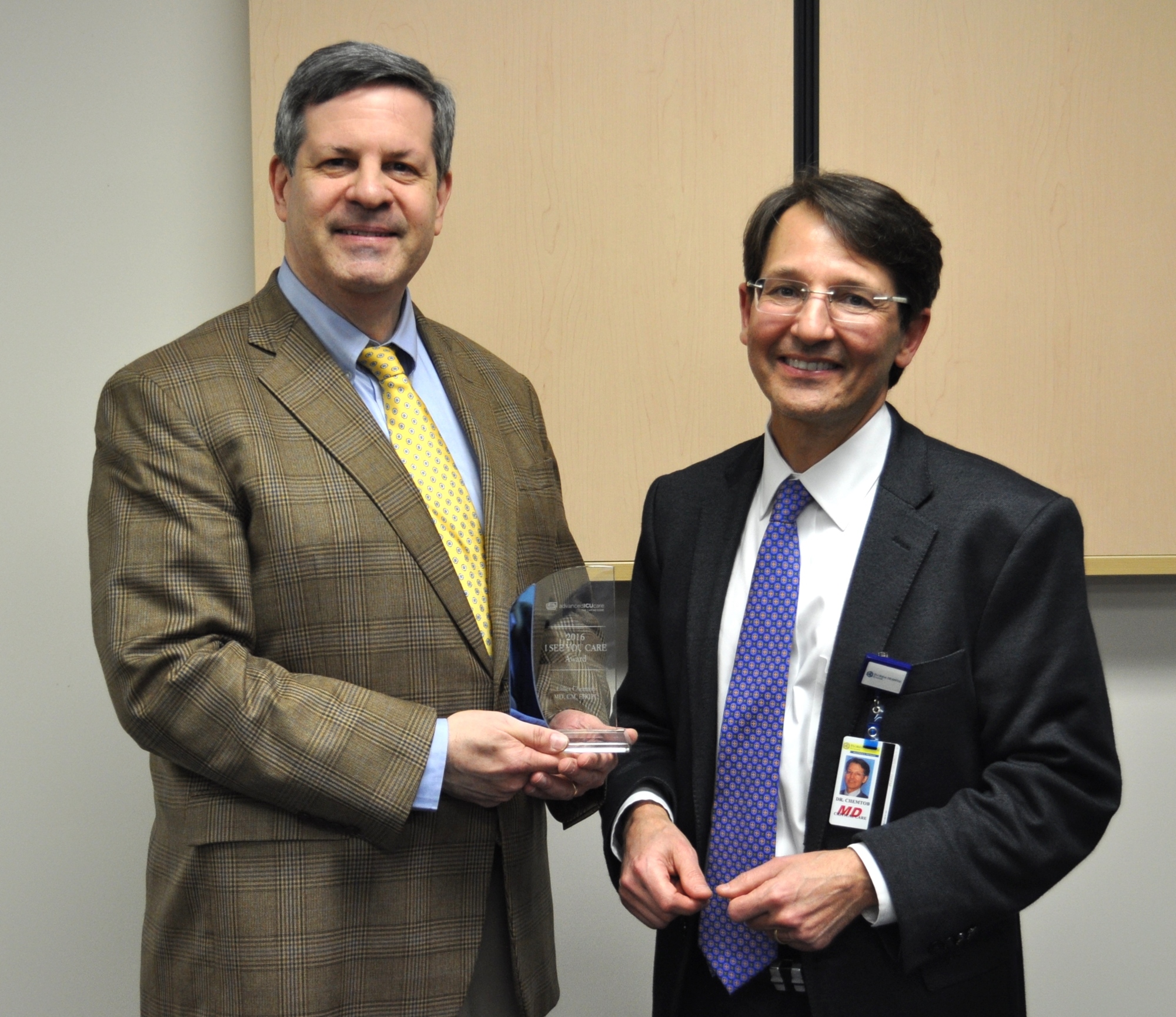 Dr. David Nierman (left) presented Dr. Gilles Chemtob (right) with the 2016 I See You Care Award.